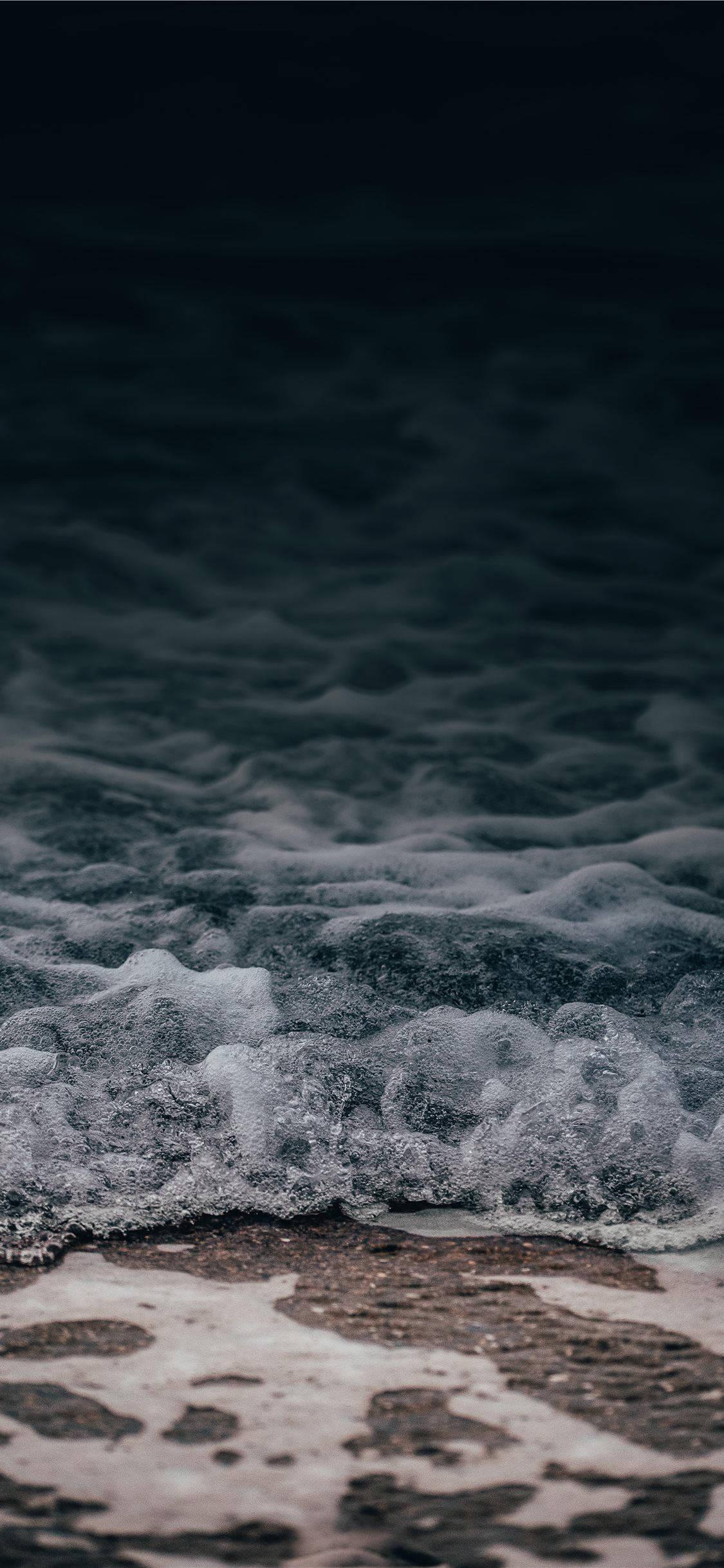 Feel the Waves of the iPhone 11 Series — 1125x2436 wallpaper