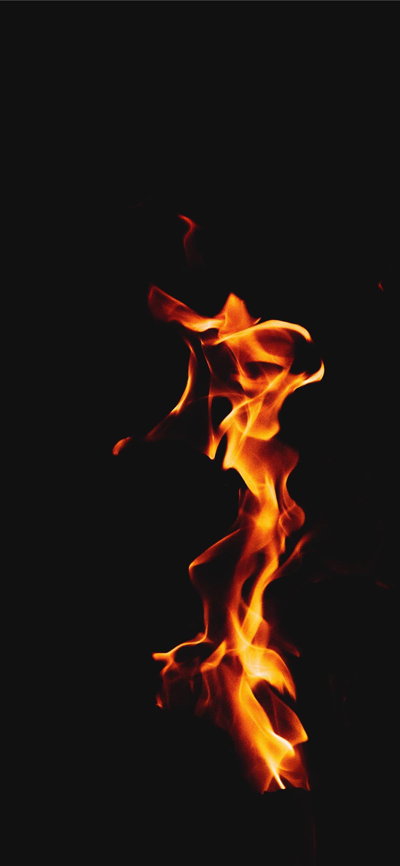Flaming Fire iPhone Dark — 1284x2778 wallpaper