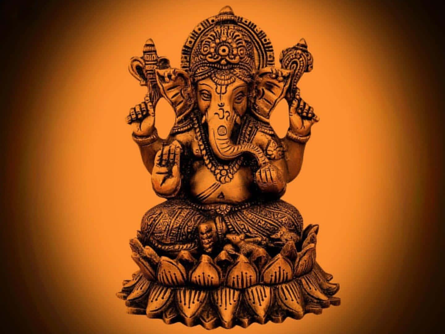 ganesha statue on an orange background — 1440x1080 wallpaper