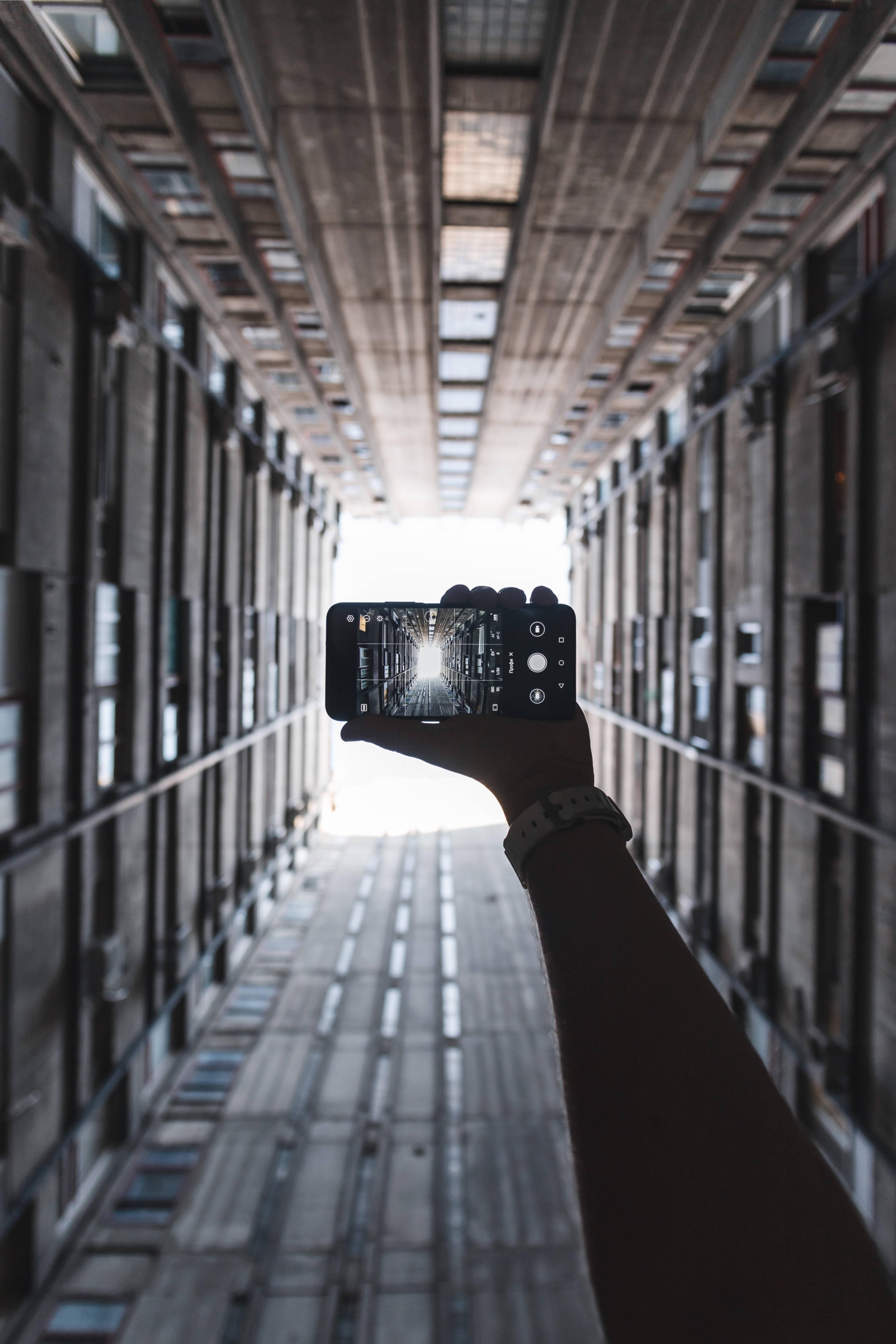 Hand Holding Phone Photo — 4006x6010 wallpaper