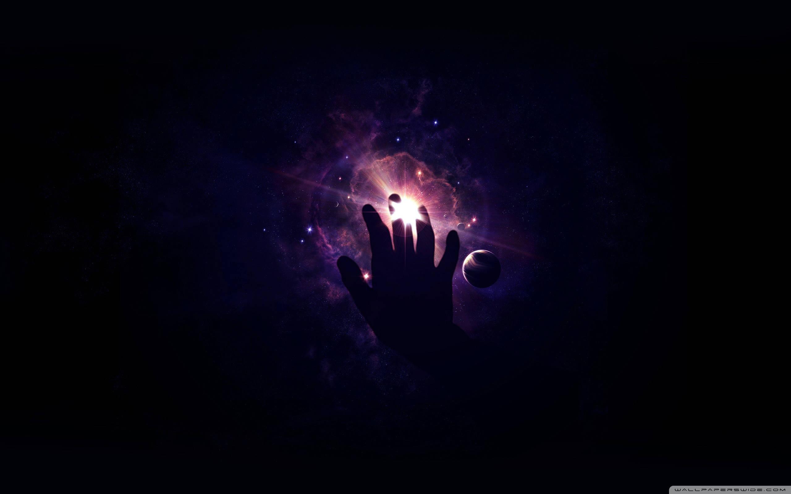 Hand Reaching Towards Universe — 2560x1600 wallpaper