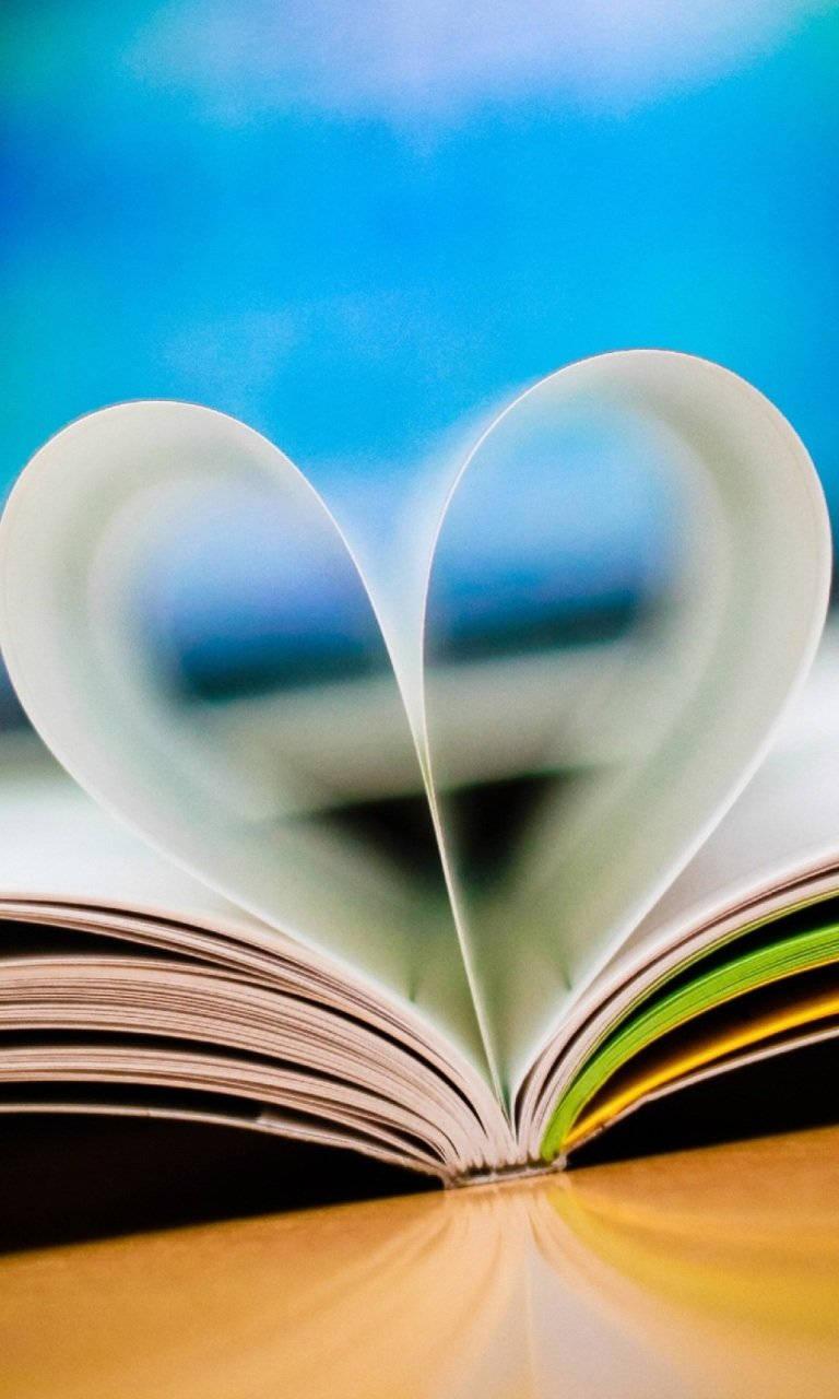 Heart-Shaped Book Pages Love Phone — 768x1280 wallpaper