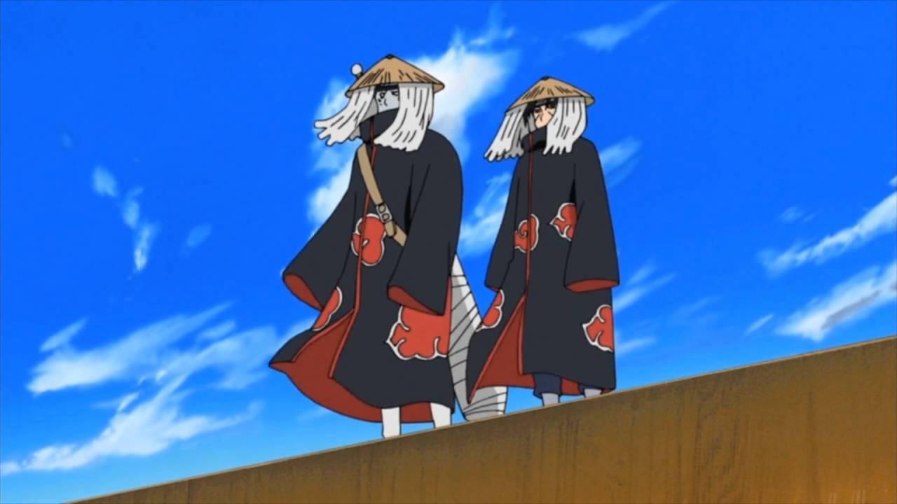 Itachi and Kisame chasing each other over a waterfall.