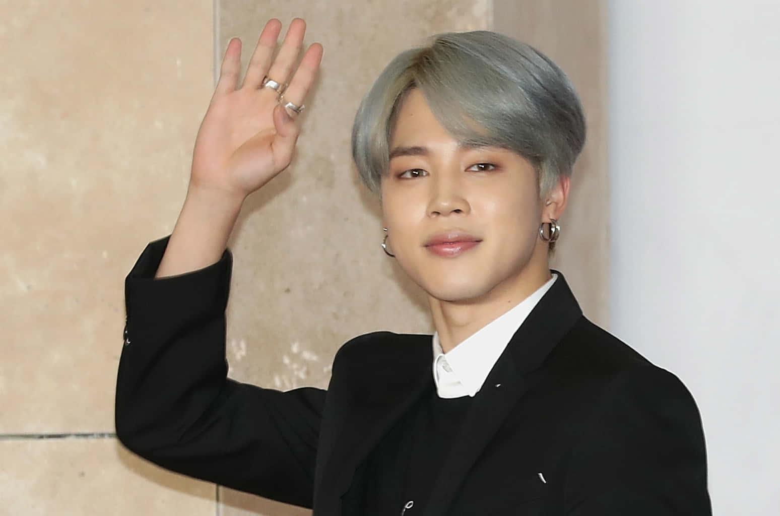Jimin of BTS is smiling confidently. — 1548x1024 wallpaper