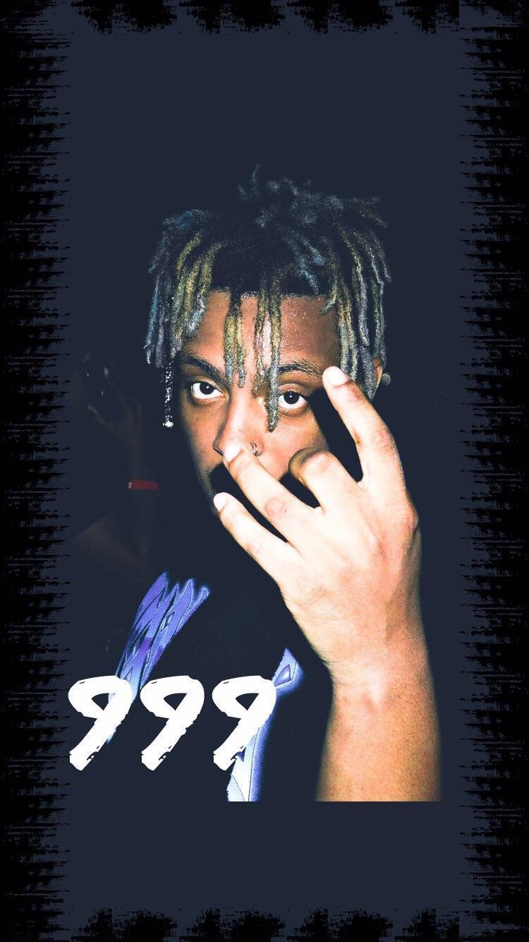 Juice Wrld performing in front of a neon-painted wall — 750x1334 wallpaper