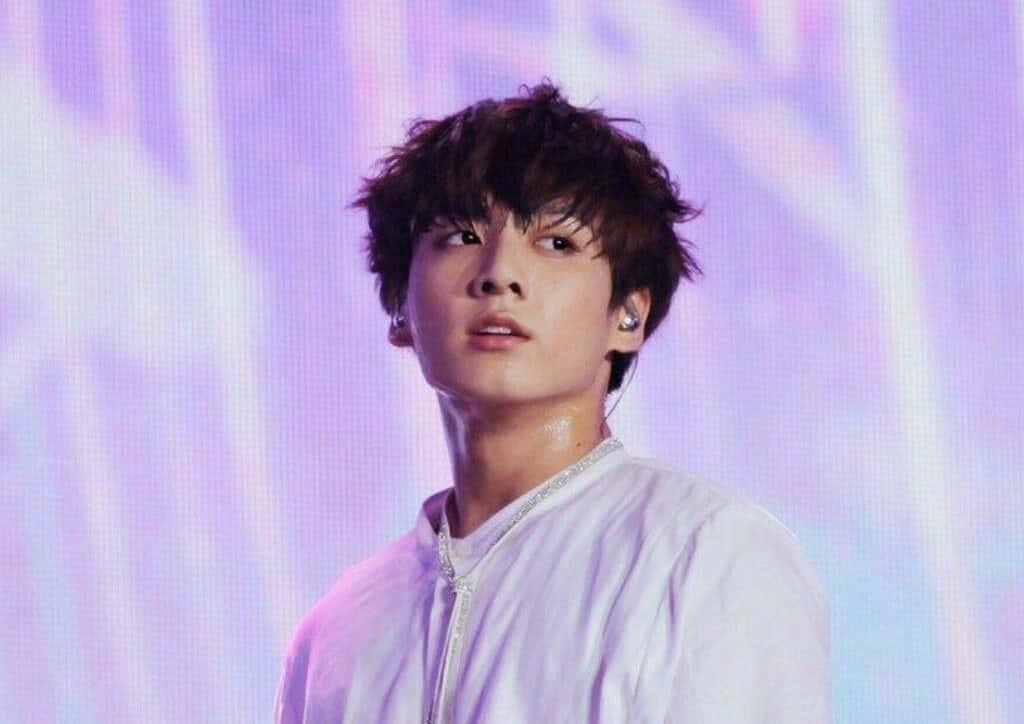 Jungkook, a South Korean singer and member of the boy band BTS, looking ahead with a determined look — 1024x724 wallpaper