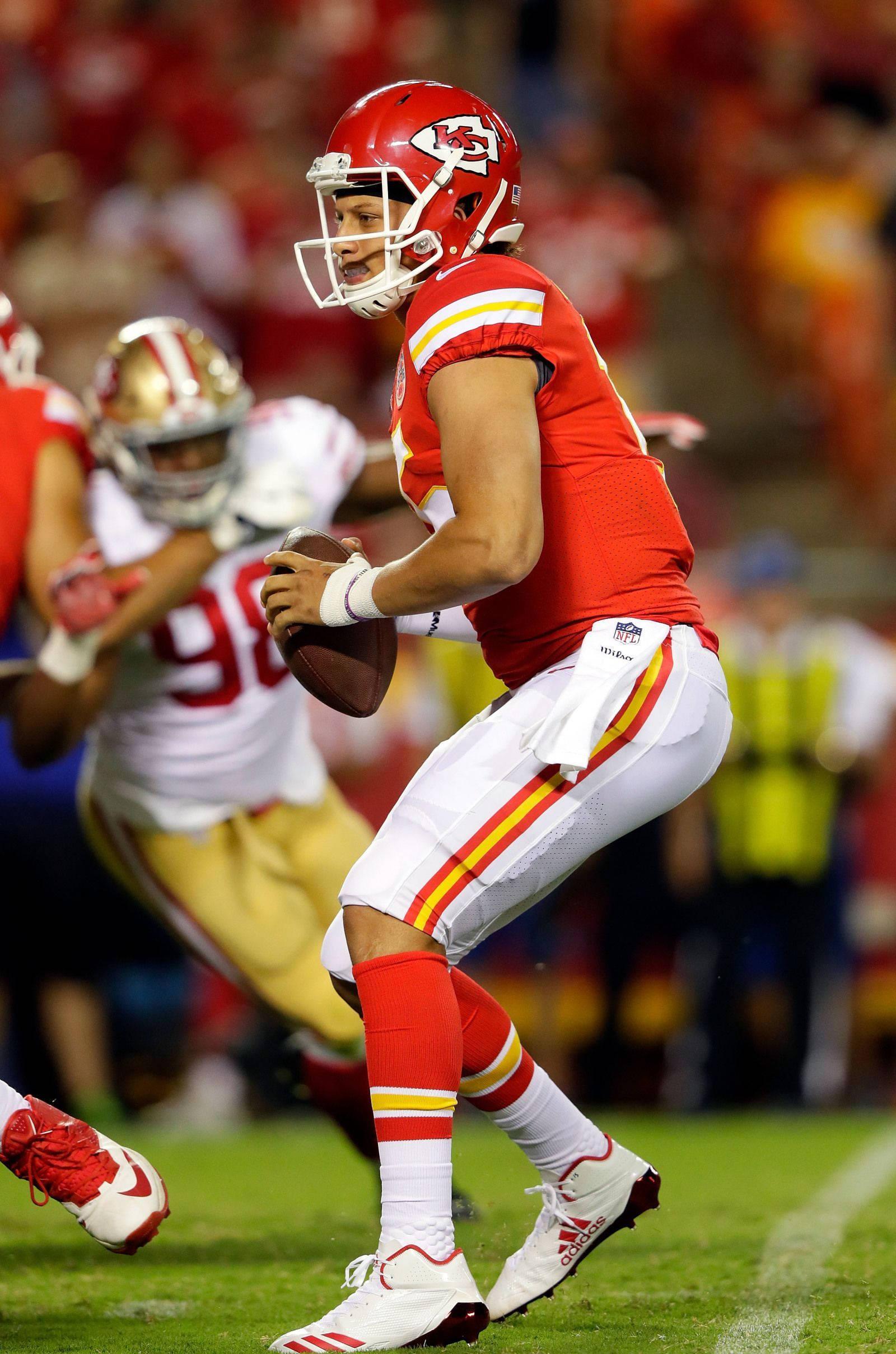 Kansas City Chiefs quarterback Patrick Mahomes prior to a game — 1600x2416 wallpaper