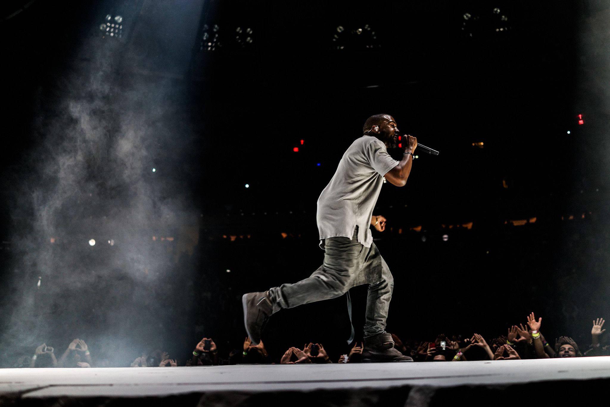 Kanye West Pacing On Stage — 2048x1365 wallpaper