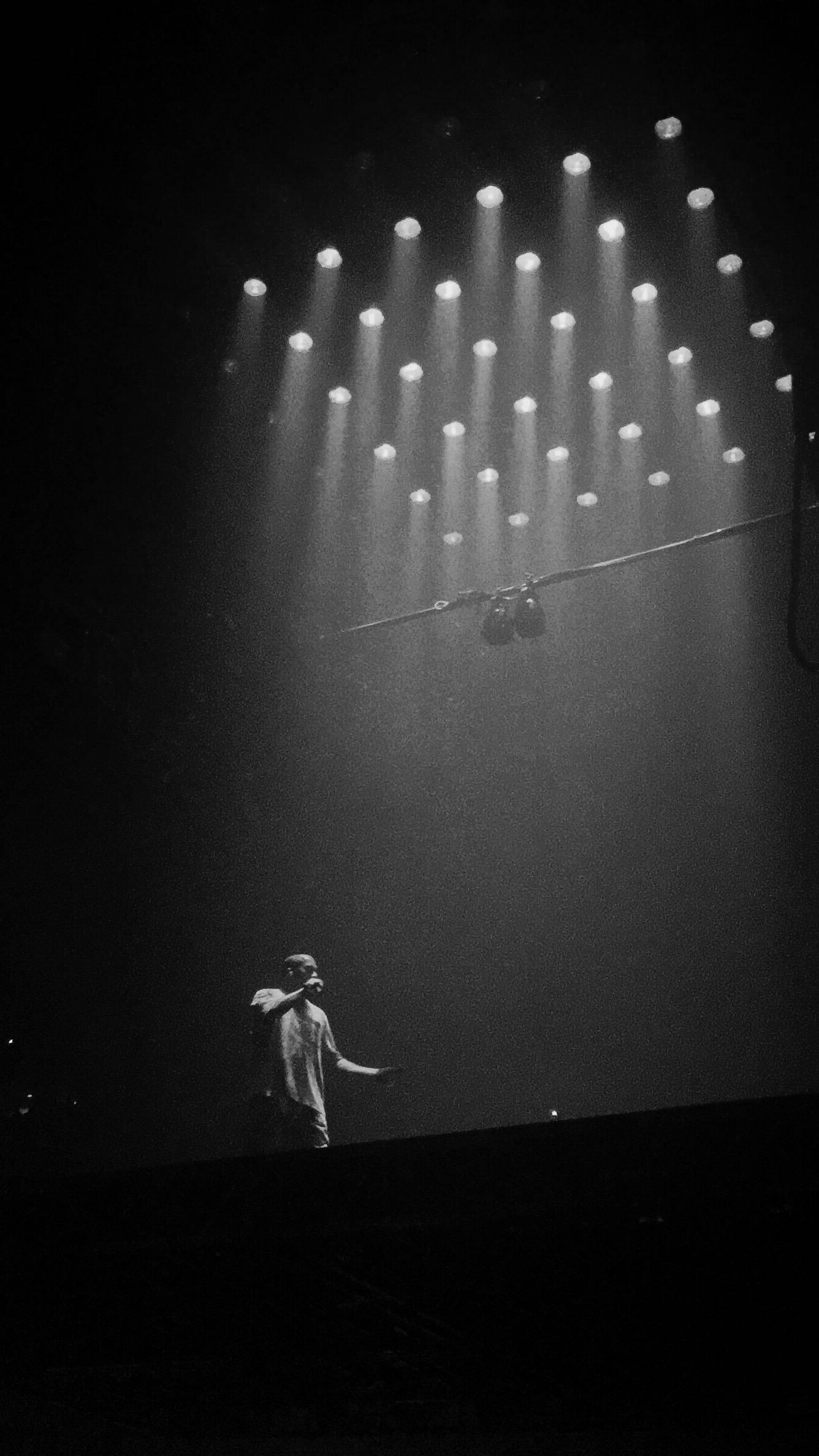 Kanye West Under Clustered Lights — 1336x2376 wallpaper
