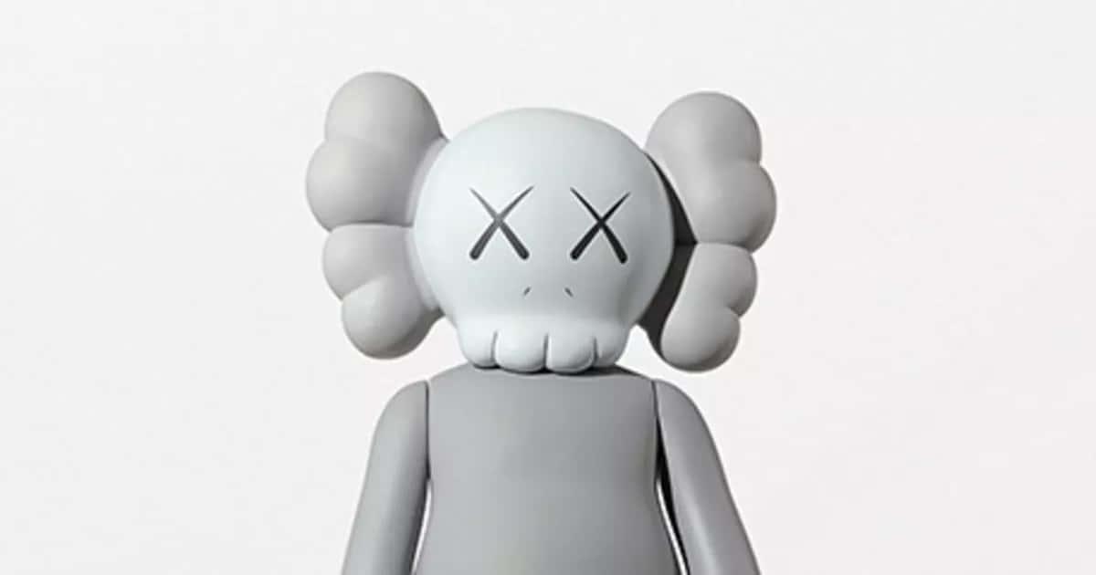 KAWS’ iconic Companion figure surrounded by floating planets — 1200x630 wallpaper