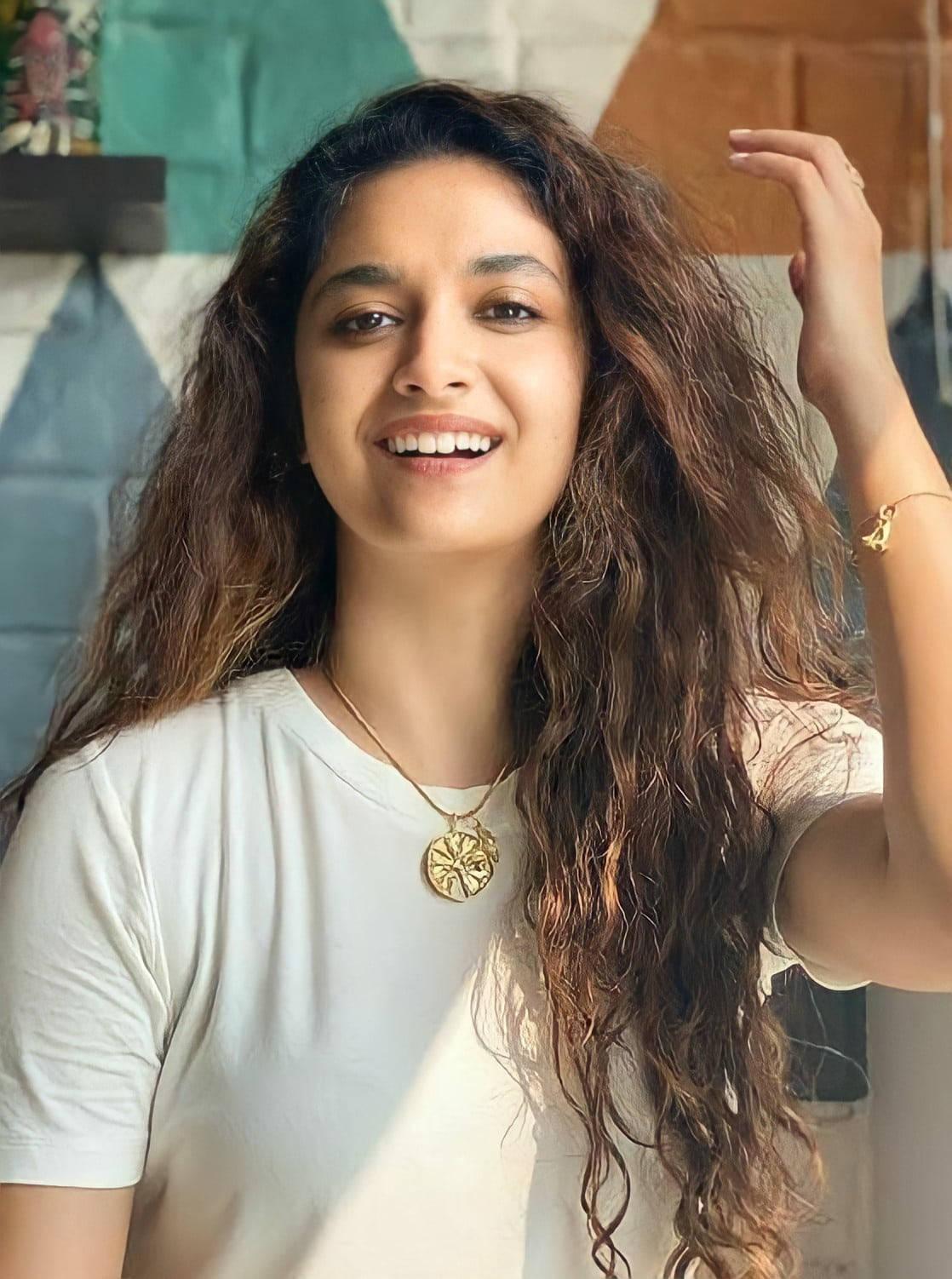 Keerthi Suresh Curly Brown Hair — 1118x1502 wallpaper