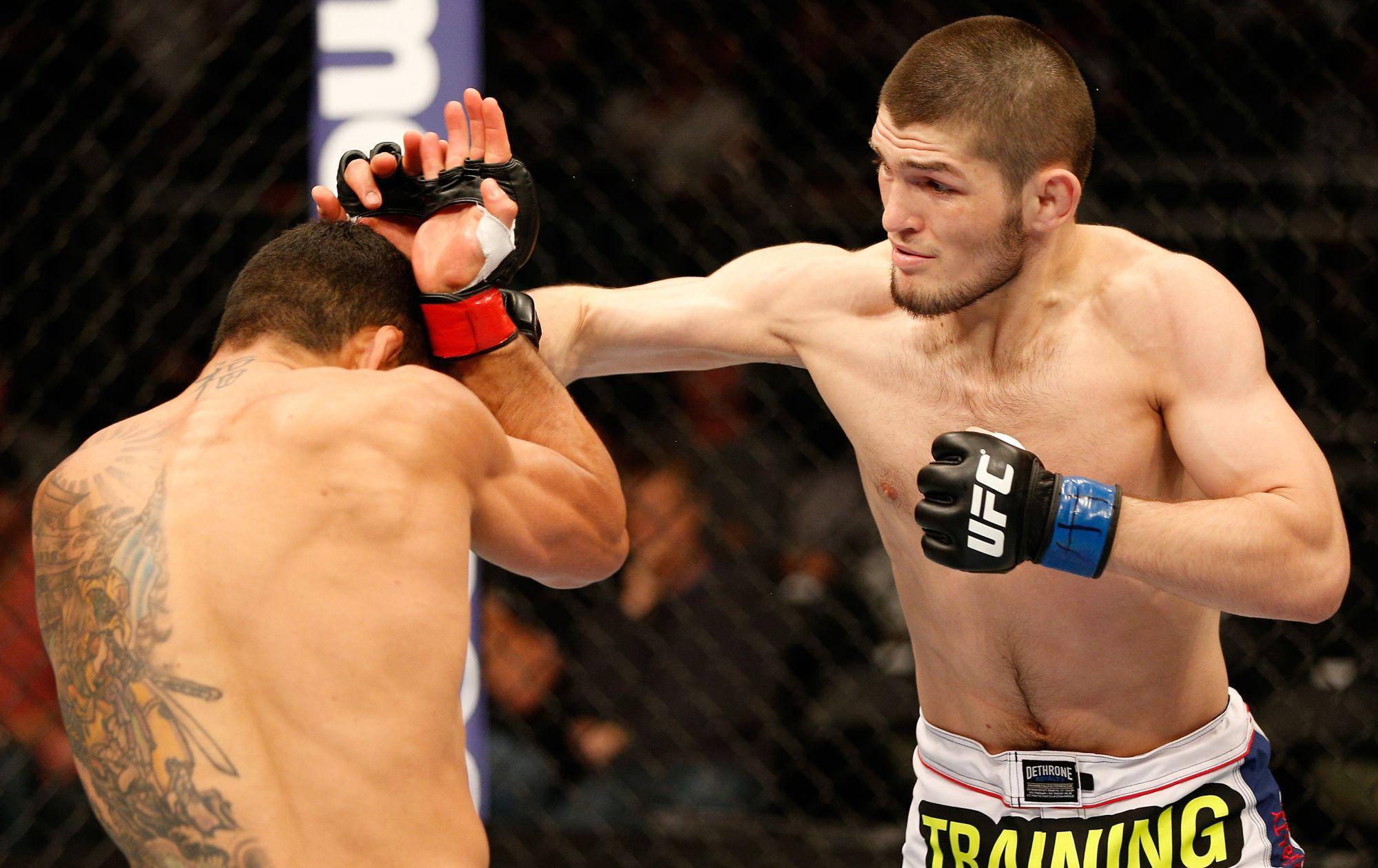 Khabib Nurmagomedov Punching — 2000x1260 wallpaper