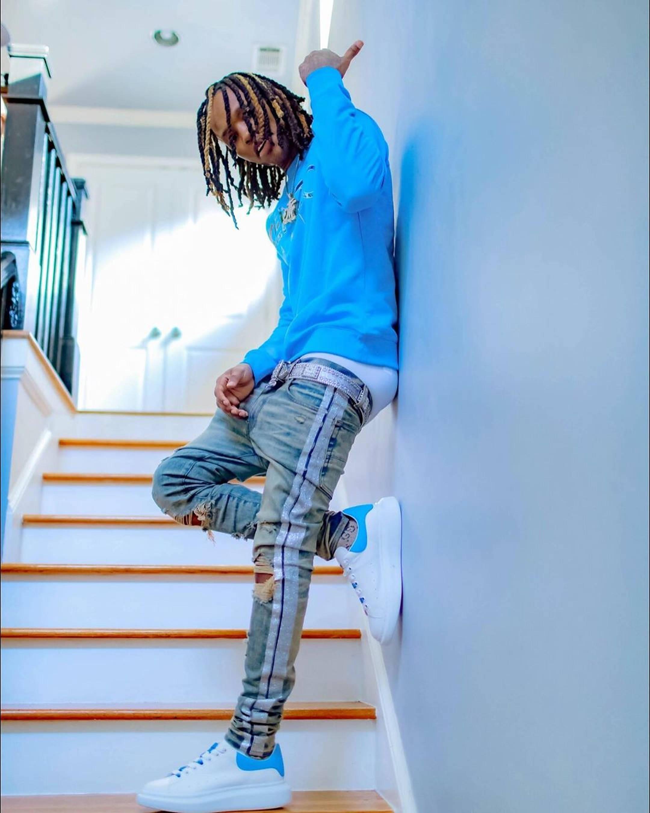 King Von looking regal atop a grand staircase. — 2160x2700 wallpaper