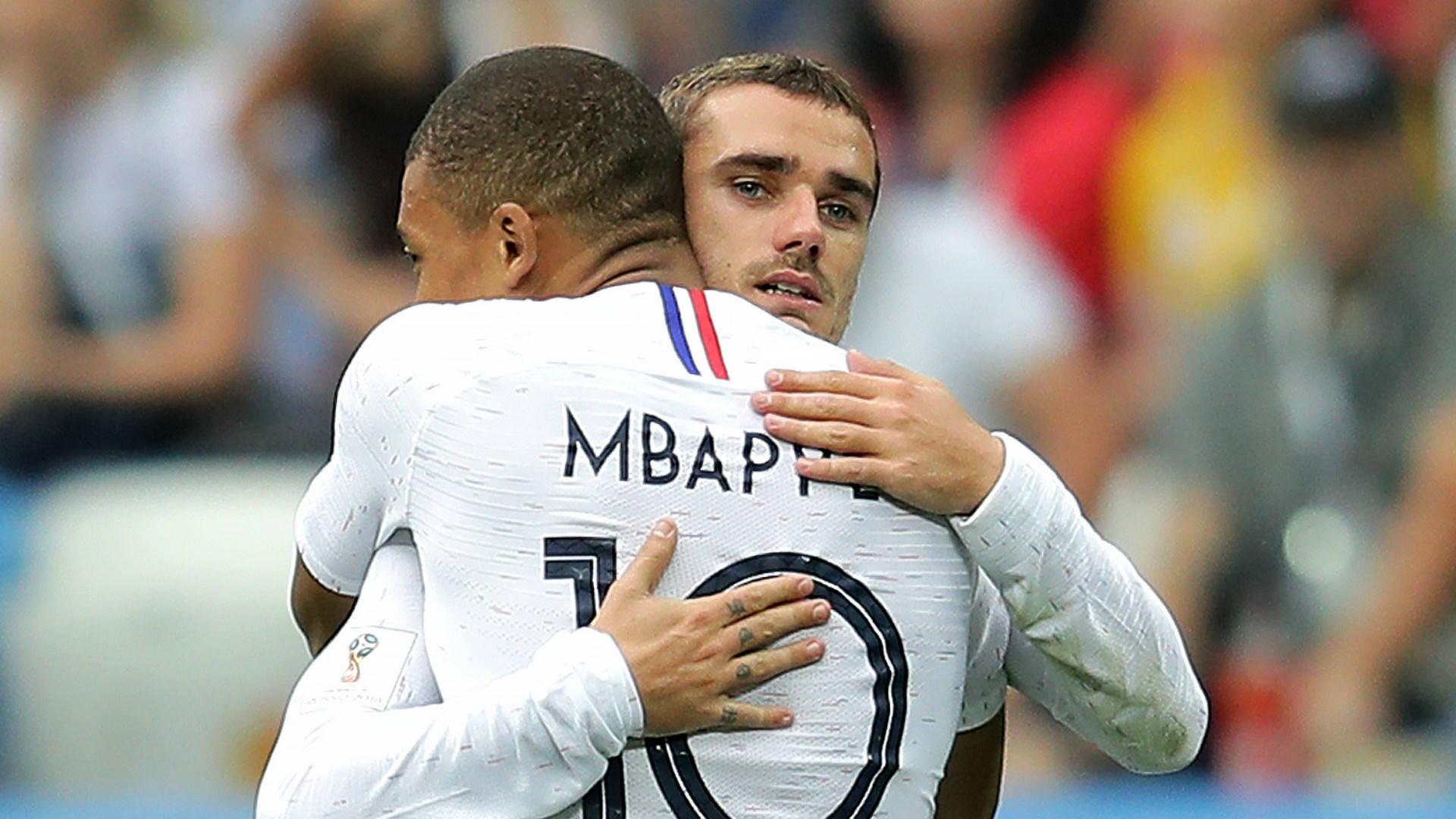 Kylian Mbappe Hugging His Teammate — 1920x1080 wallpaper