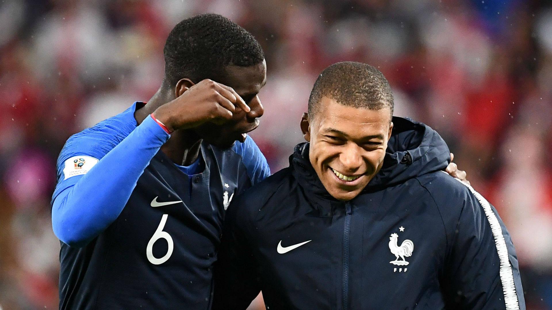 Kylian Mbappe Side-Hugging Pogba — 1920x1080 wallpaper