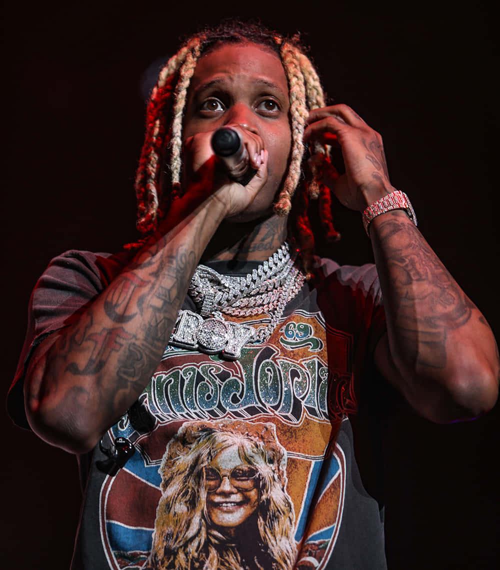 Lil Durk strikes a pose in stylish streetwear — 1000x1140 wallpaper