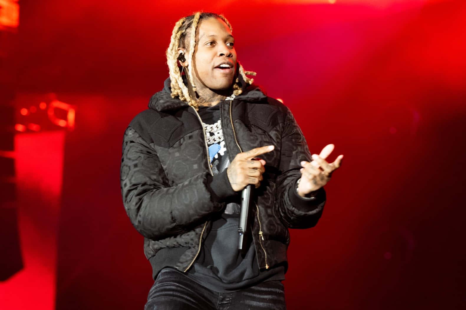 Lil Durk striking a pose for the camera during a photoshoot — 1581x1054 wallpaper