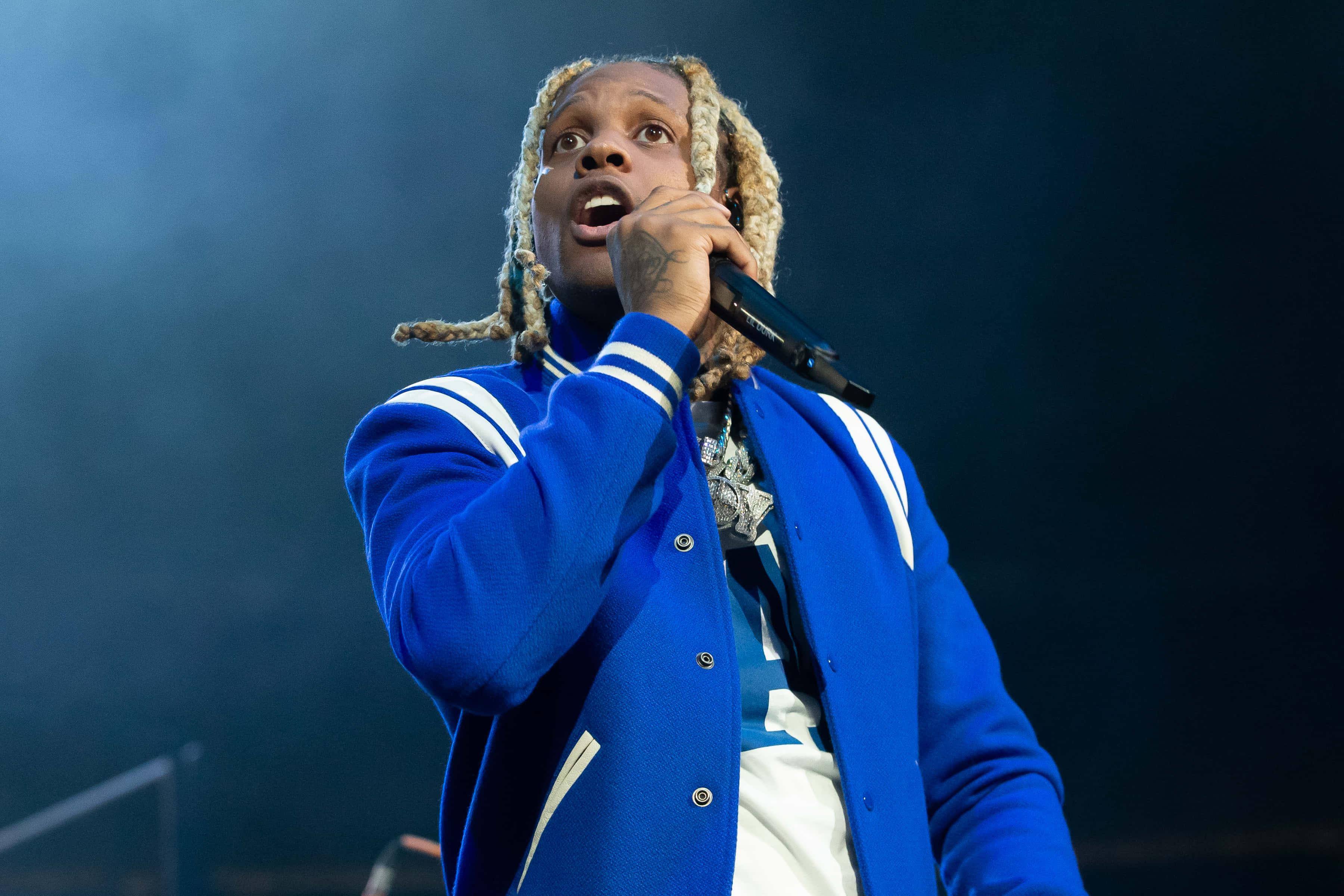 Lil Durk striking a pose in a stylish outfit — 3600x2400 wallpaper