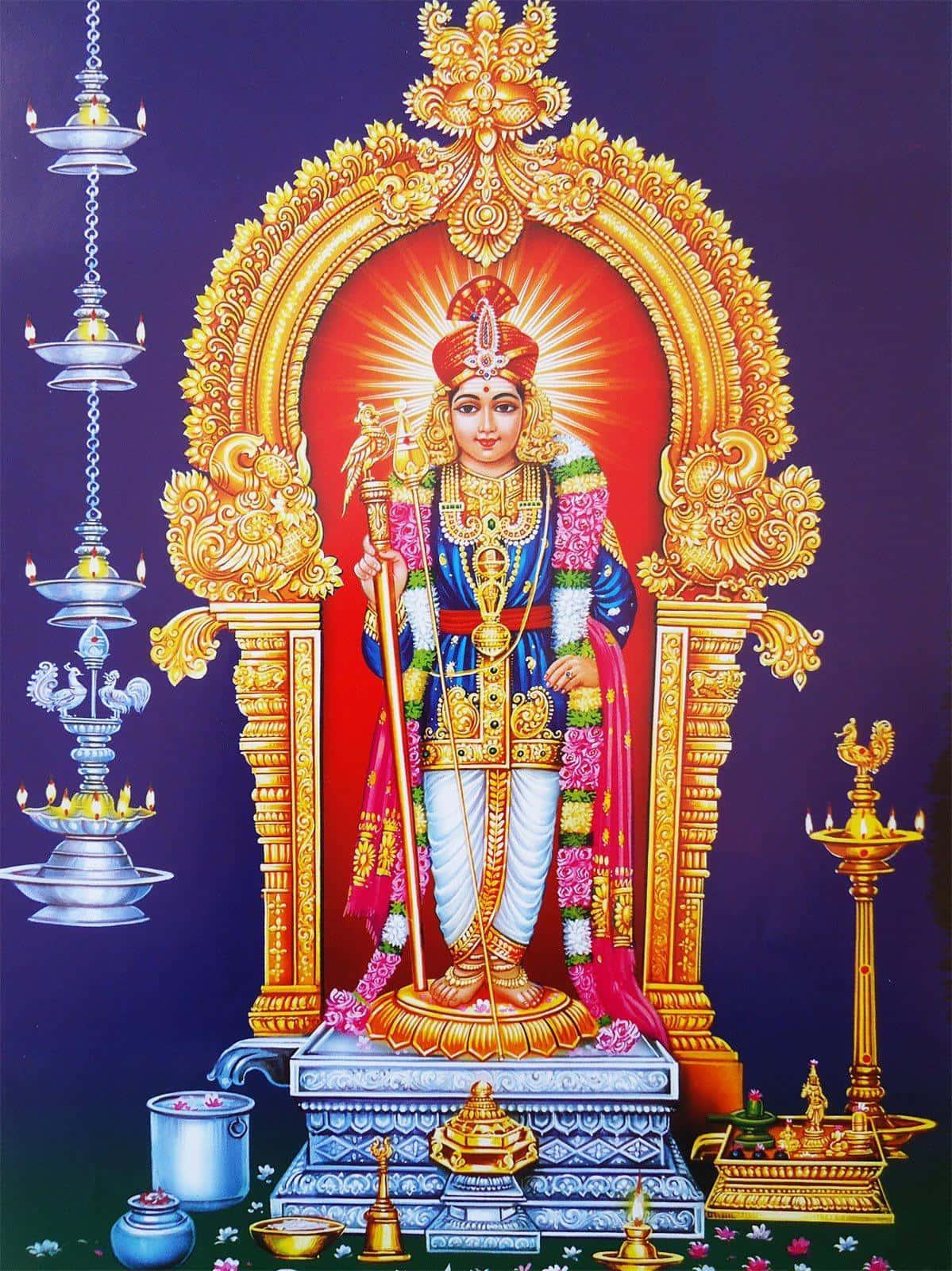 lord ganesha in a temple with gold and silver