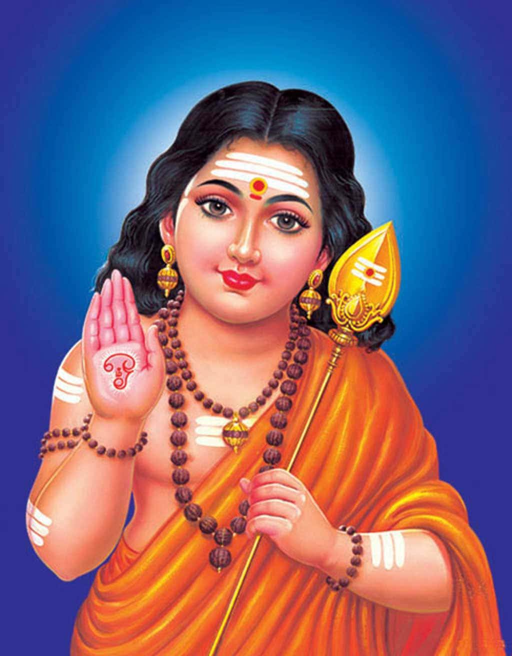 lord shiva in orange robe holding a sacrificial horn