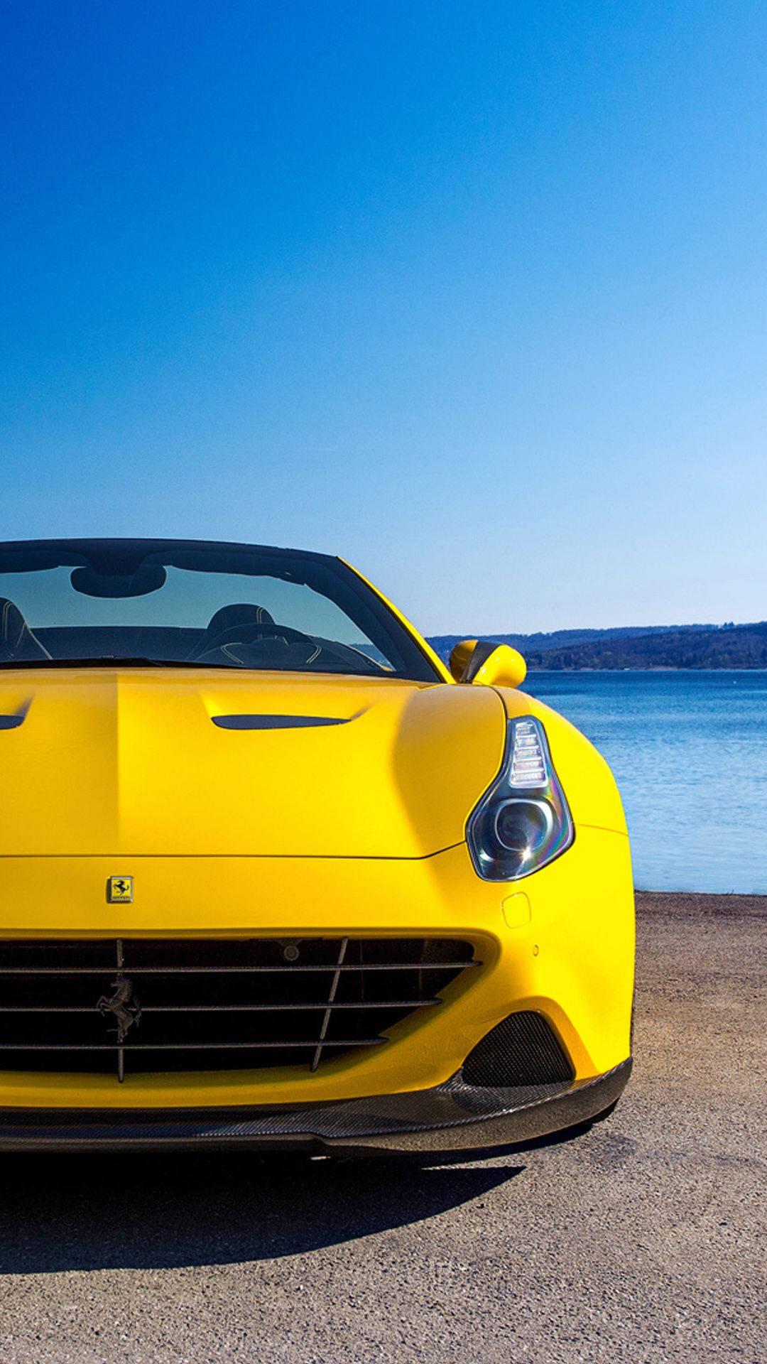 Luxury and Speed: Ferrari F12 Shining Bright in Yellow — 1080x1920 wallpaper