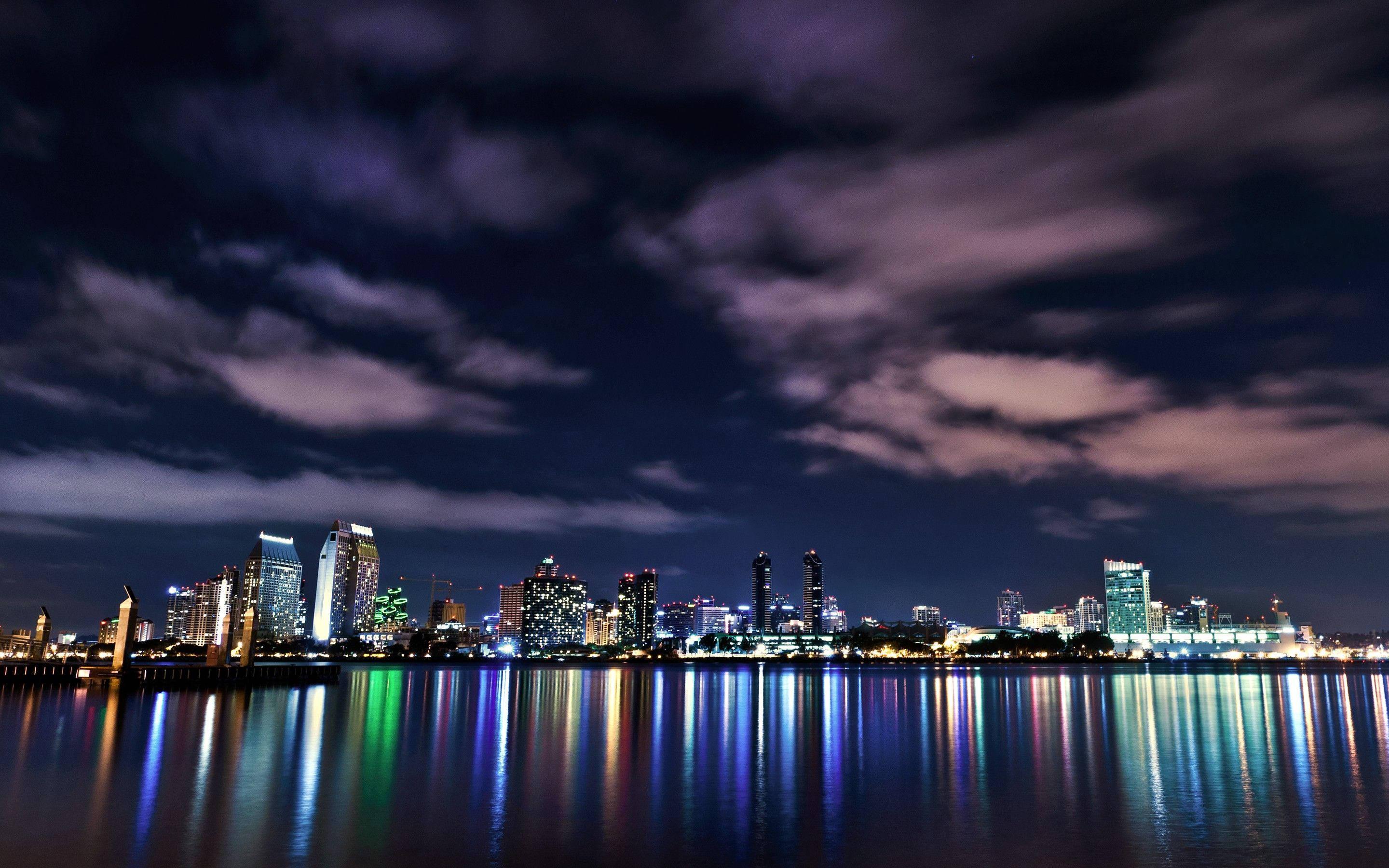 MacBook Pro Glowing Cityscape — 2880x1800 wallpaper