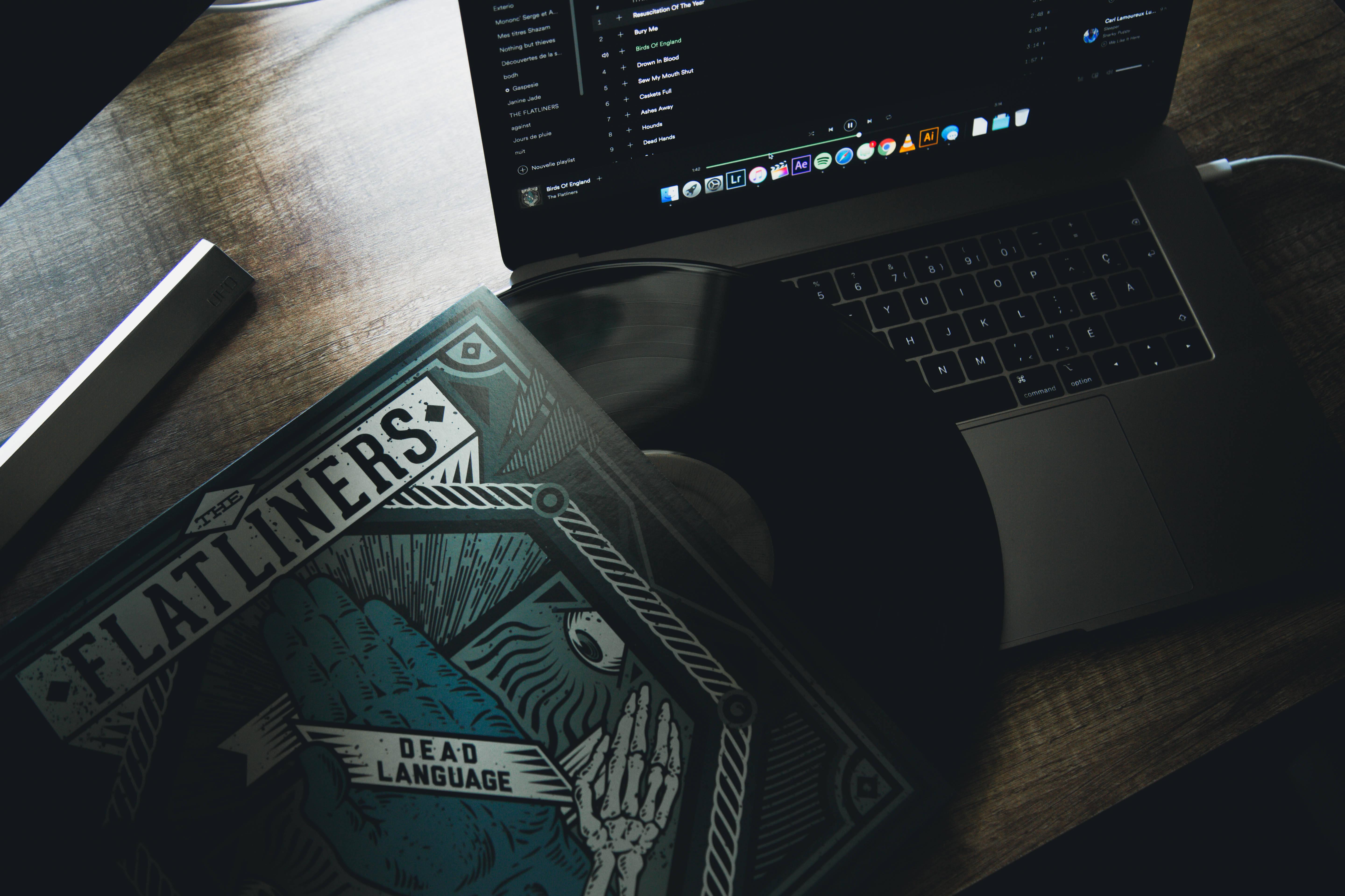 MacBook Pro With Vinyl Music — 5760x3840 wallpaper