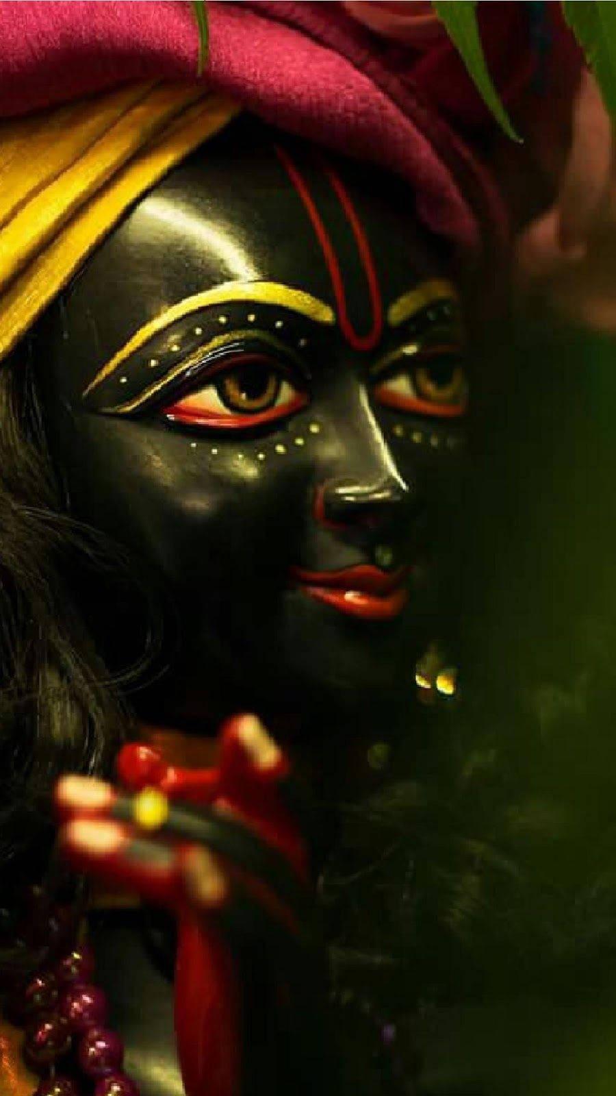 Majestic Black Krishna Statue Taken with Phone Camera — 900x1600 wallpaper
