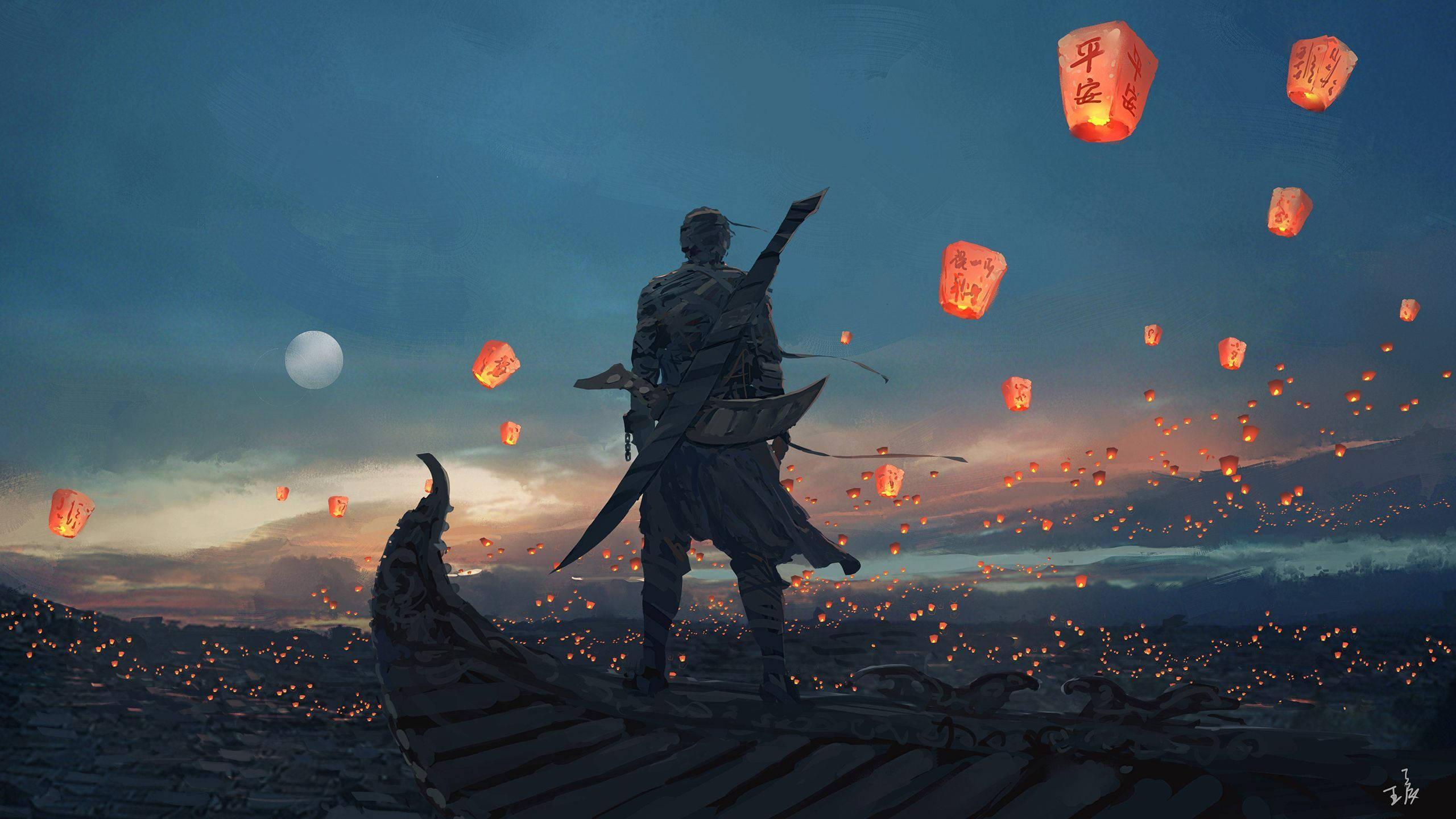 Man appreciating the beauty of the sky lanterns — 2560x1440 wallpaper