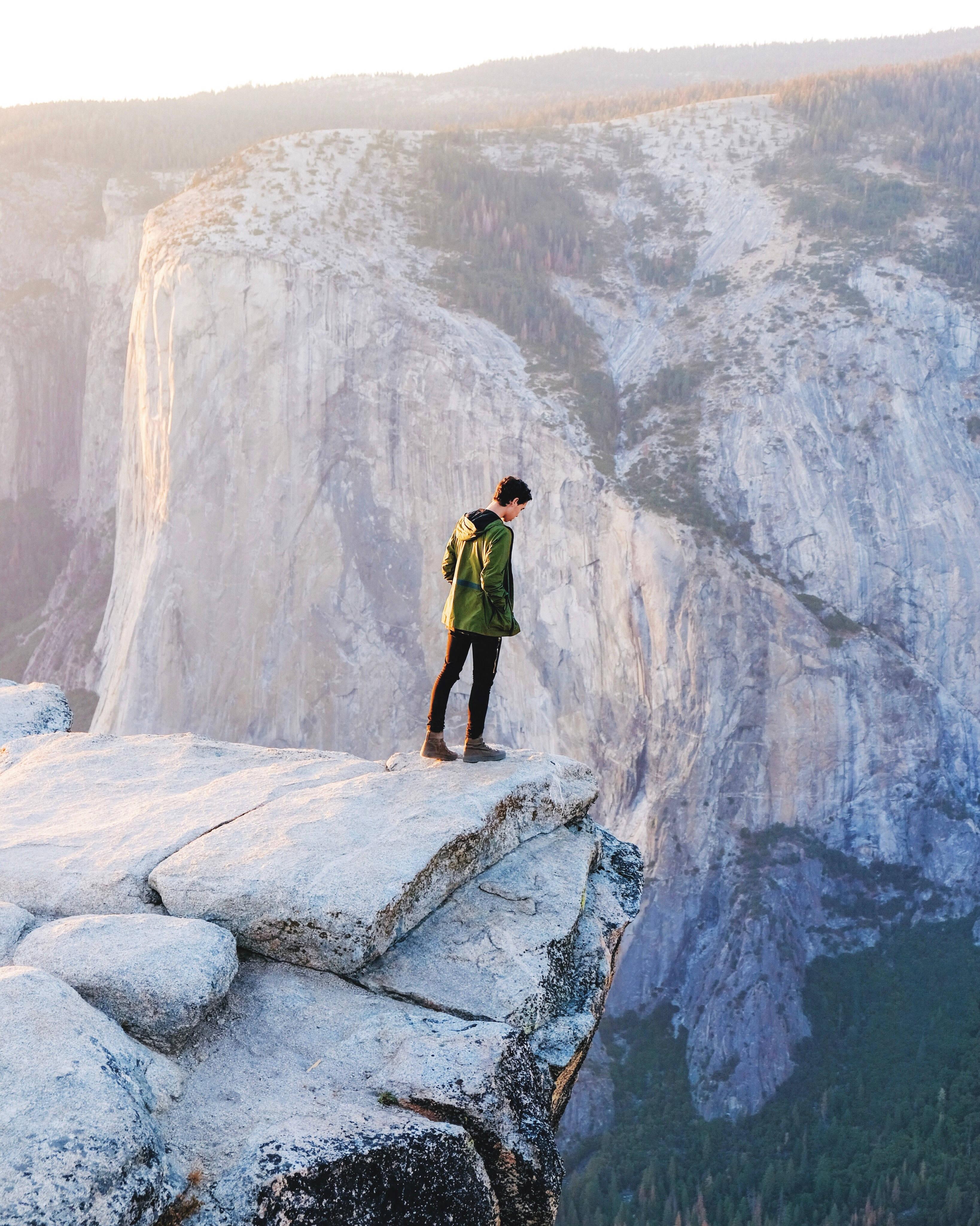 Man On A Cliff Iphone Live — 3276x4096 wallpaper