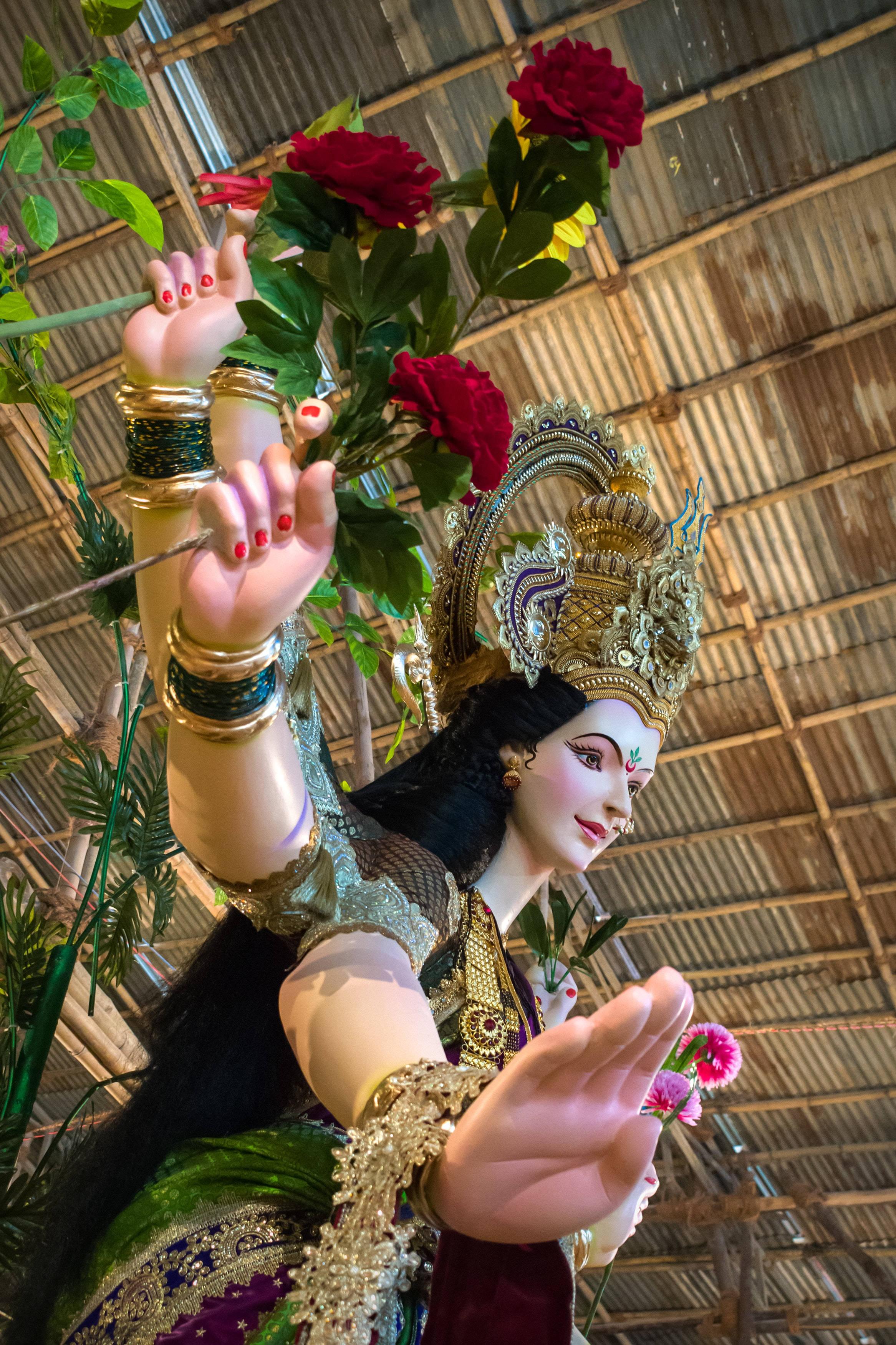 Mata Rani Holding Flowers — 2333x3500 wallpaper