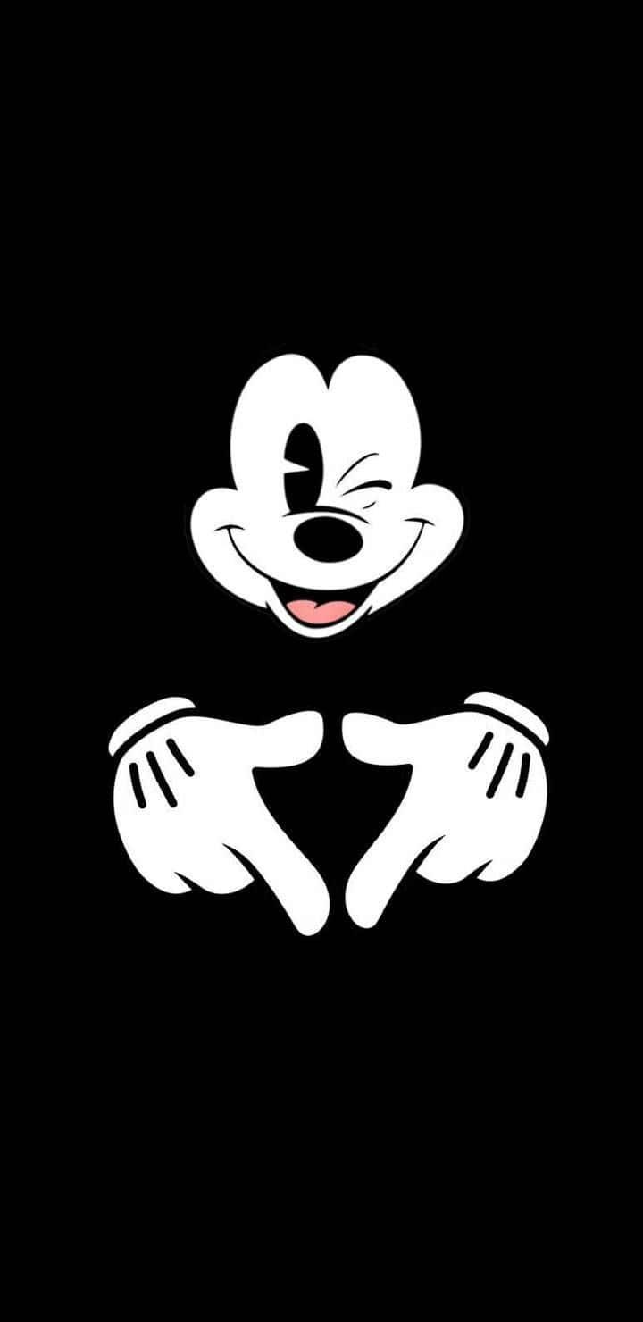 Mickey Mouse grins in readiness for a magical adventure. — 720x1480 wallpaper