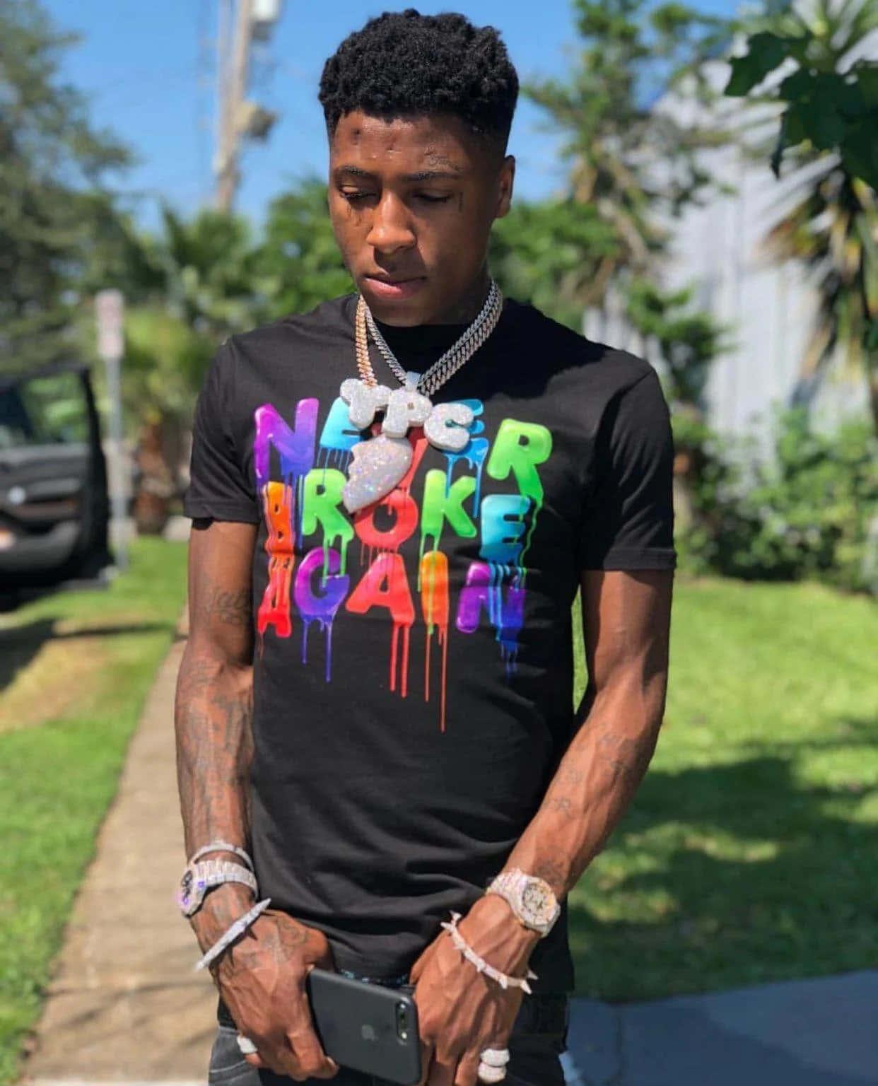 Nba Youngboy asserting his status — 1242x1536 wallpaper