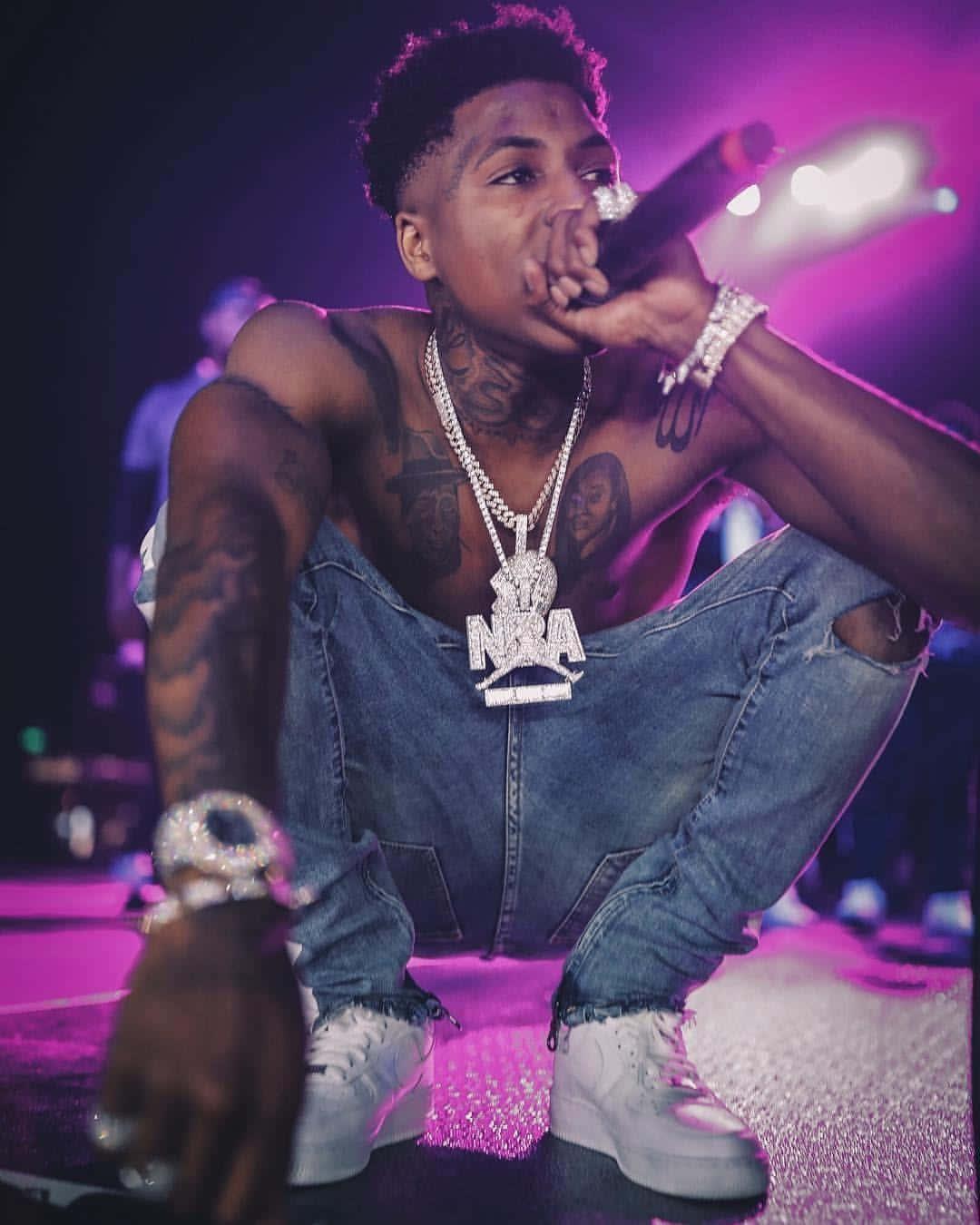 NBA Youngboy performs onstage during his star-studded show. — 1080x1350 wallpaper