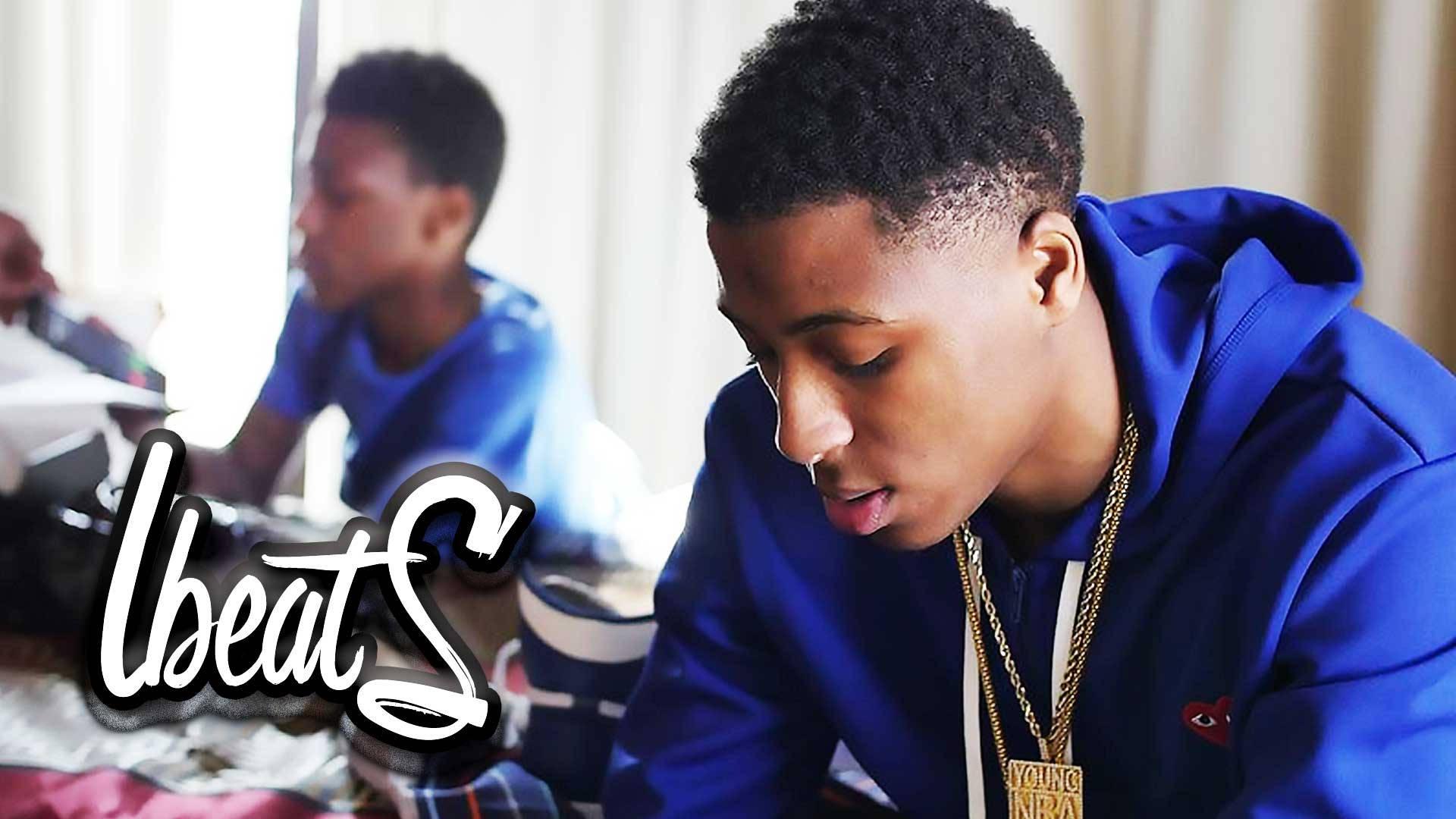 NBA Youngboy playing basketball in blue hoodie — 1920x1080 wallpaper