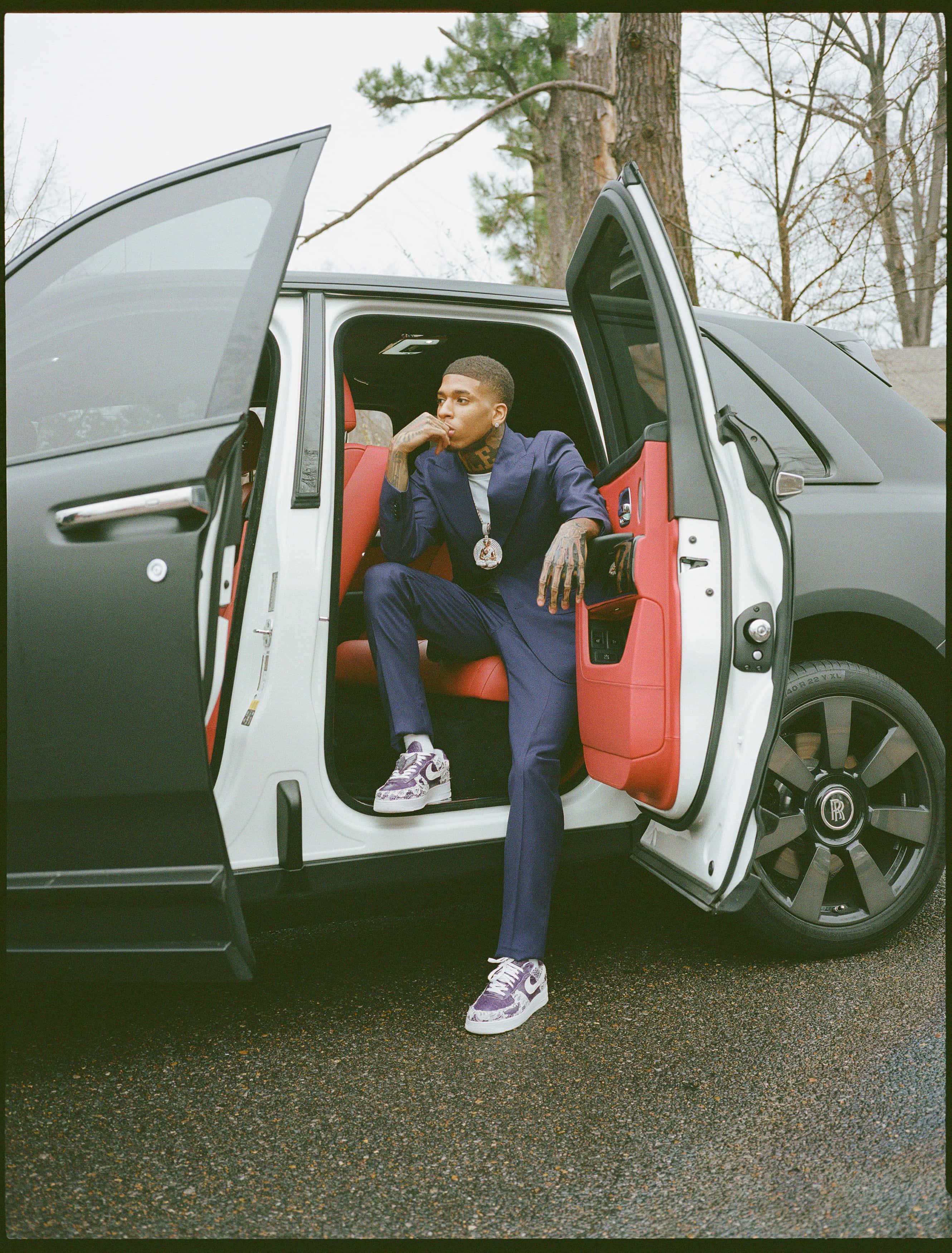 NLE Choppa in a stylish pose — 2660x3500 wallpaper