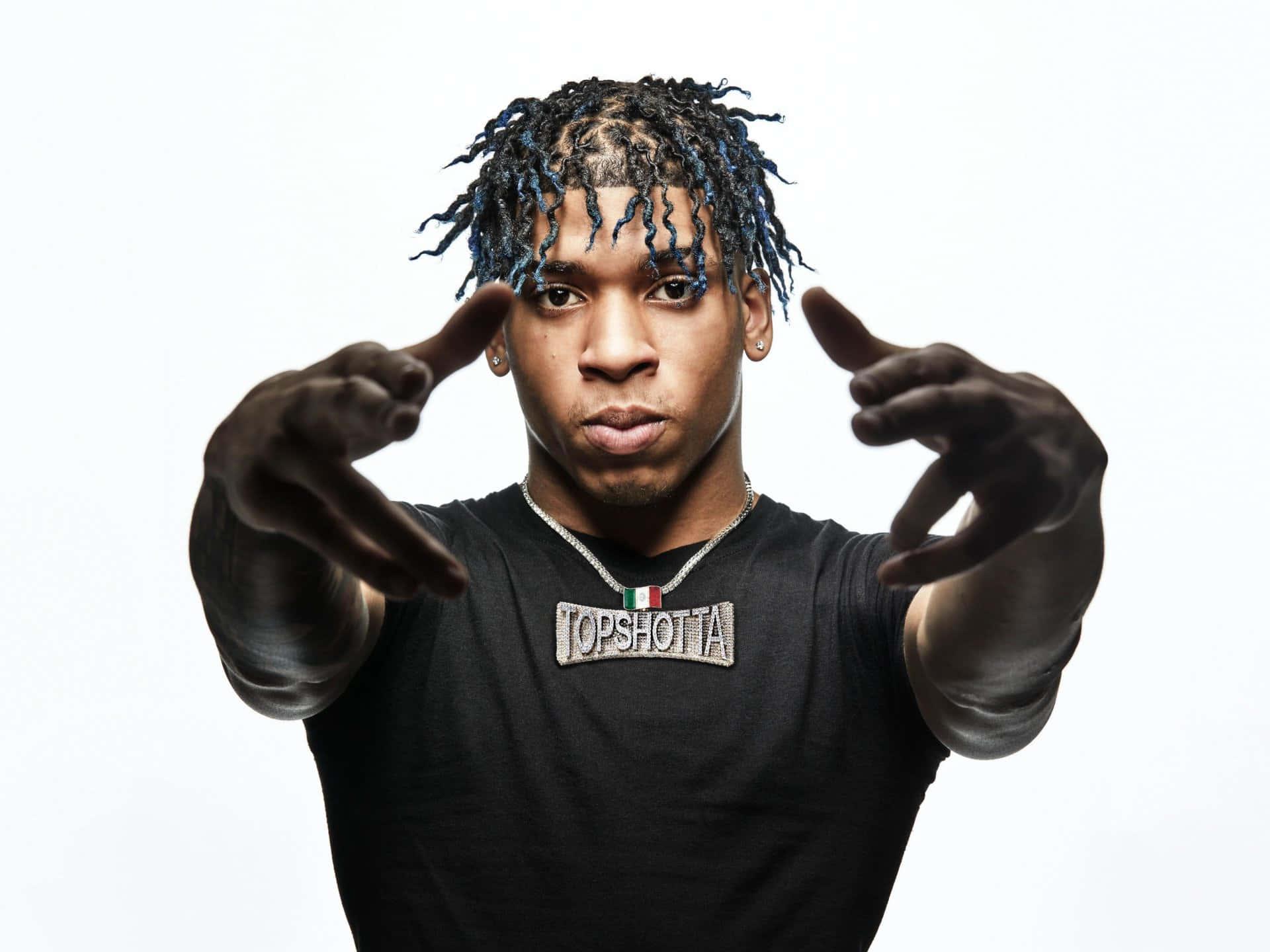NLE Choppa Performing on Stage — 1920x1440 wallpaper