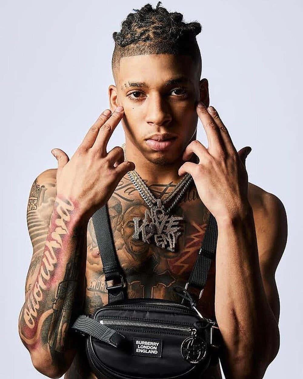 NLE Choppa Poses in a Stylish Outfit — 1000x1250 wallpaper