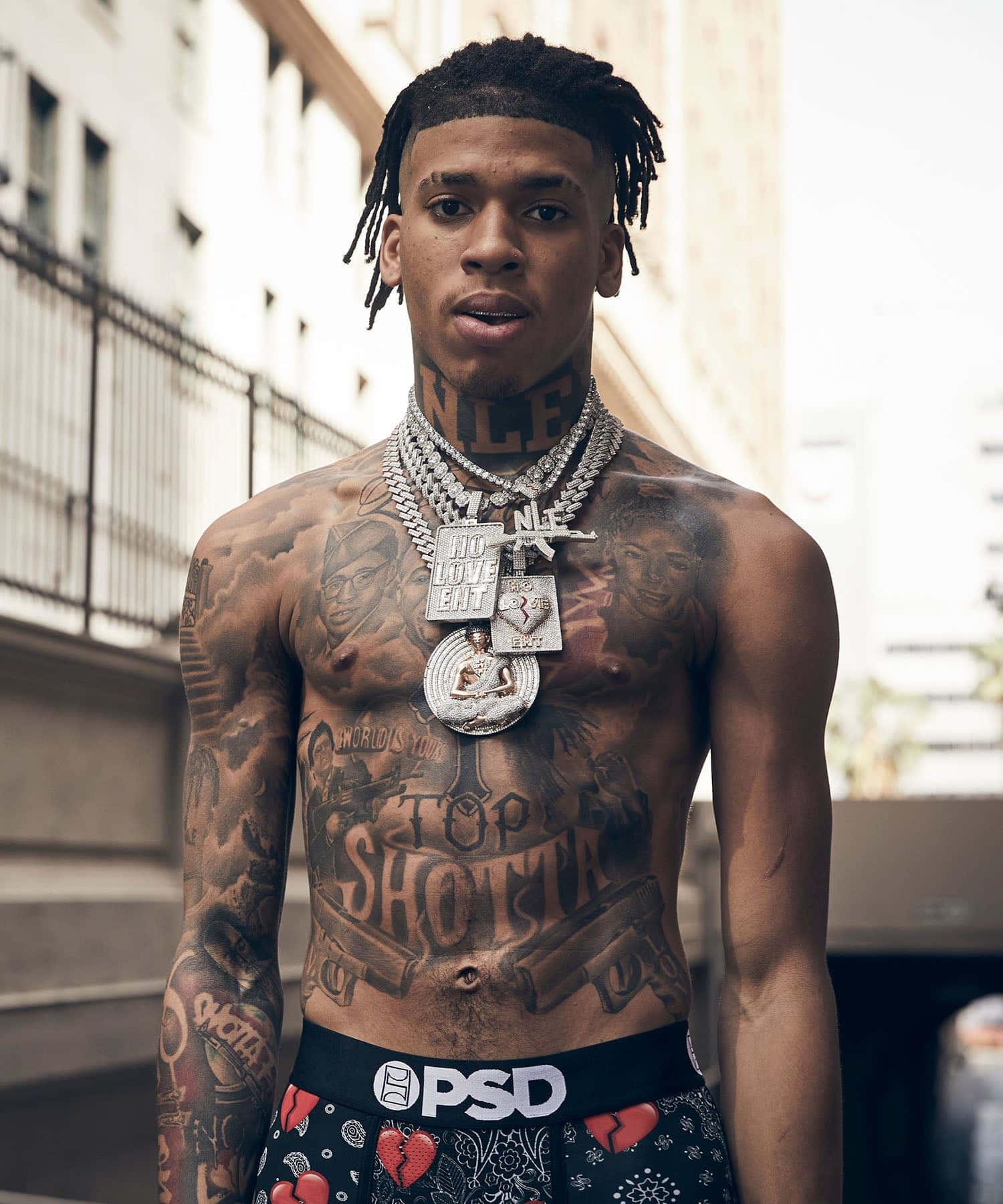 NLE Choppa posing for a portrait in a casual outfit — 1500x1800 wallpaper
