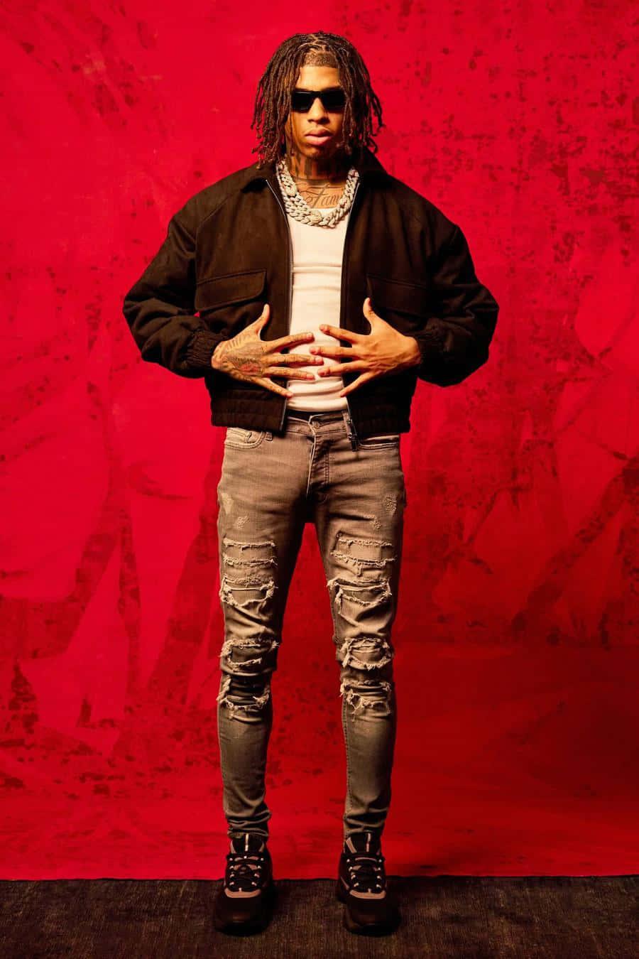 NLE Choppa strikes a pose in a casual outfit — 900x1350 wallpaper