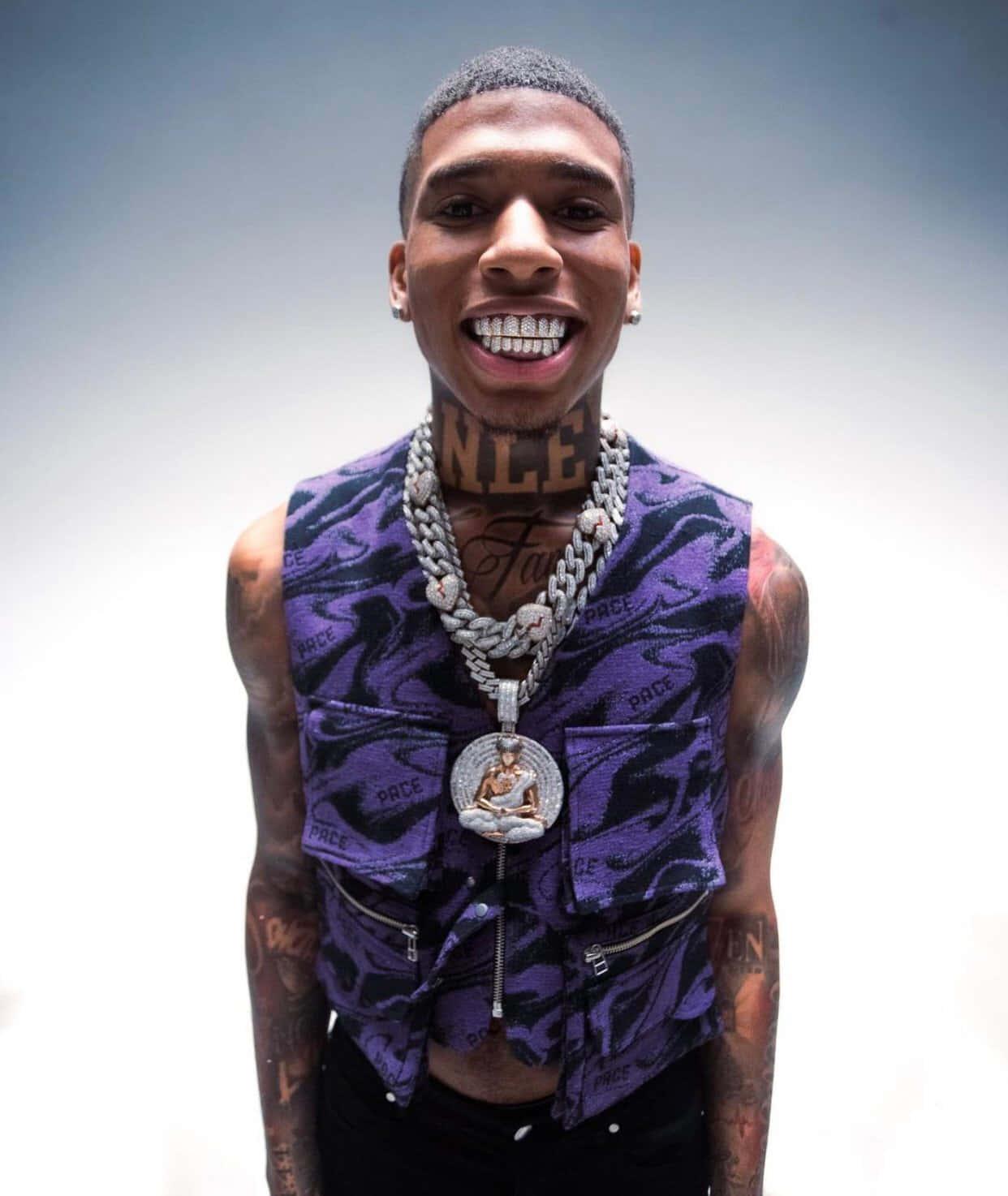 Nle Choppa striking a bold pose — 1242x1474 wallpaper