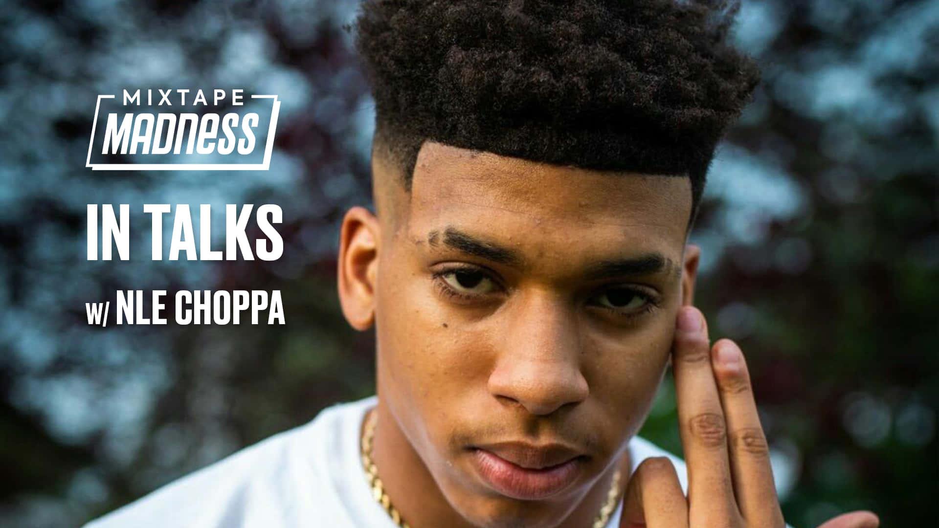 Nle Choppa striking a pose during a photoshoot — 1920x1080 wallpaper