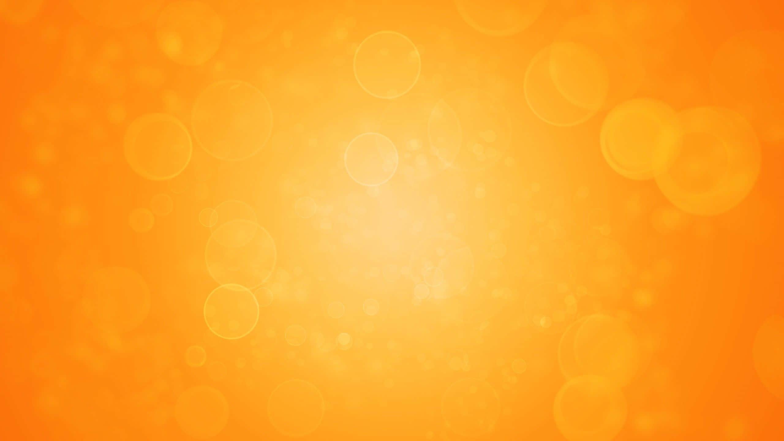 orange bokeh background vector — 2560x1440 wallpaper