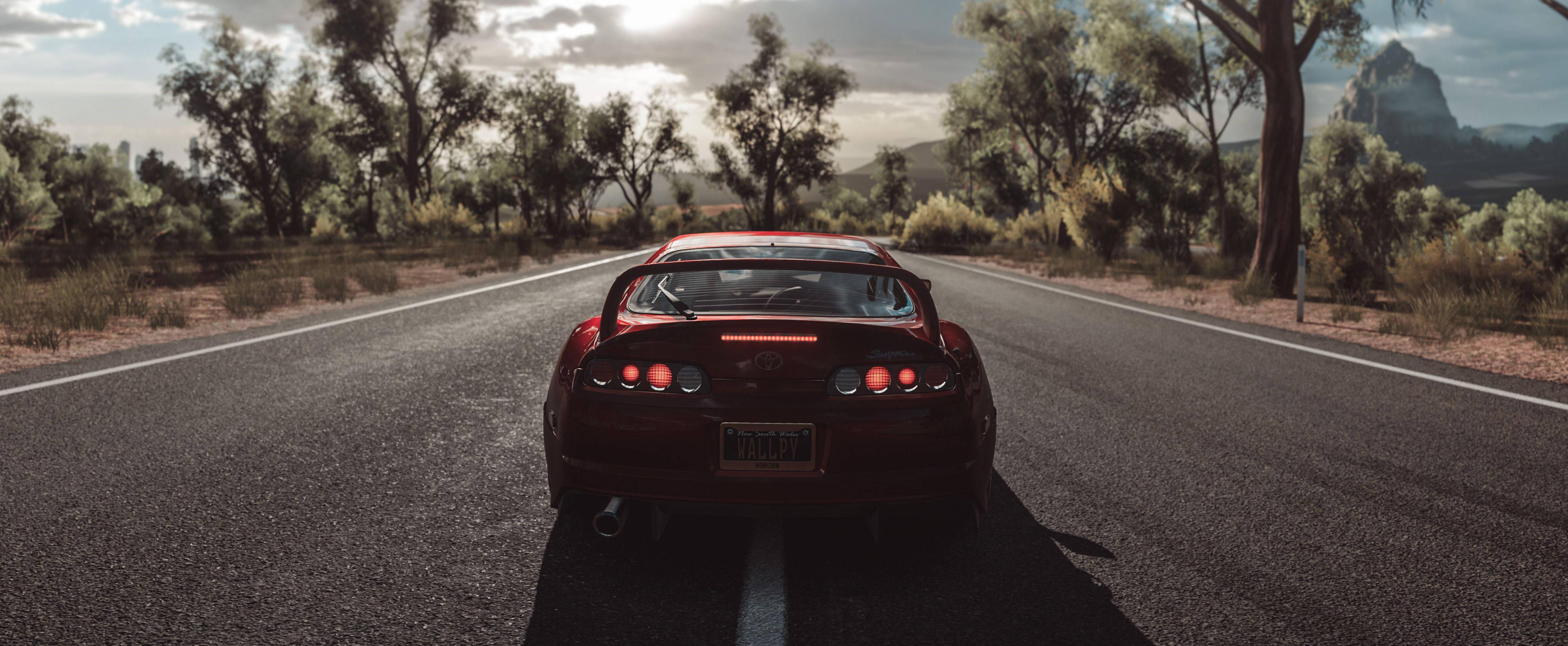 Parked Red Toyota Supra At Road — 4131x1701 wallpaper