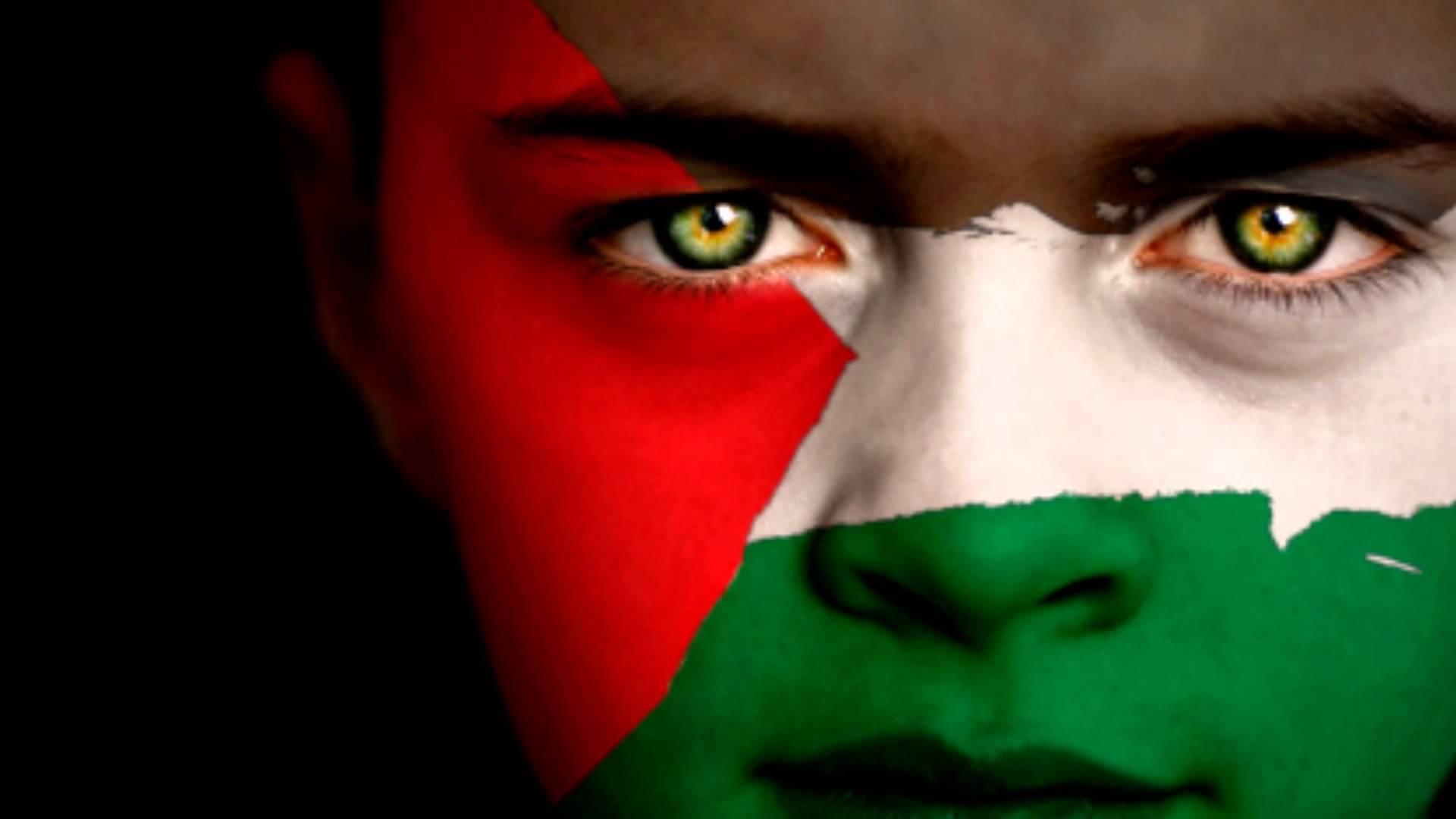 Passionate Supporter with Painted Palestine Flag on Face — 1920x1080 wallpaper