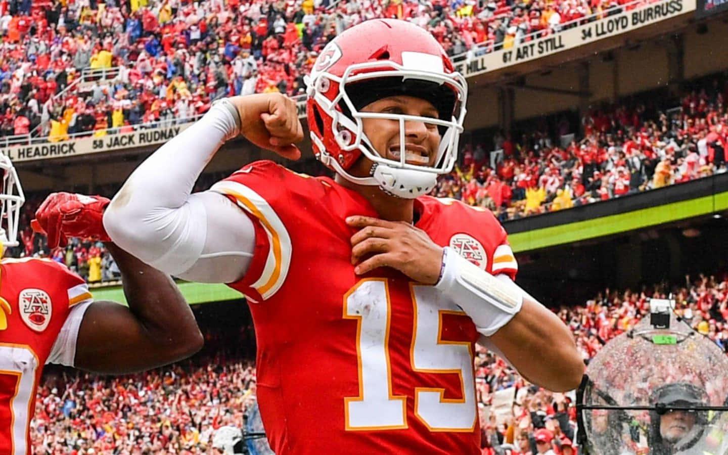 Patrick Mahomes showing his exceptional skills on the field — 1440x900 wallpaper