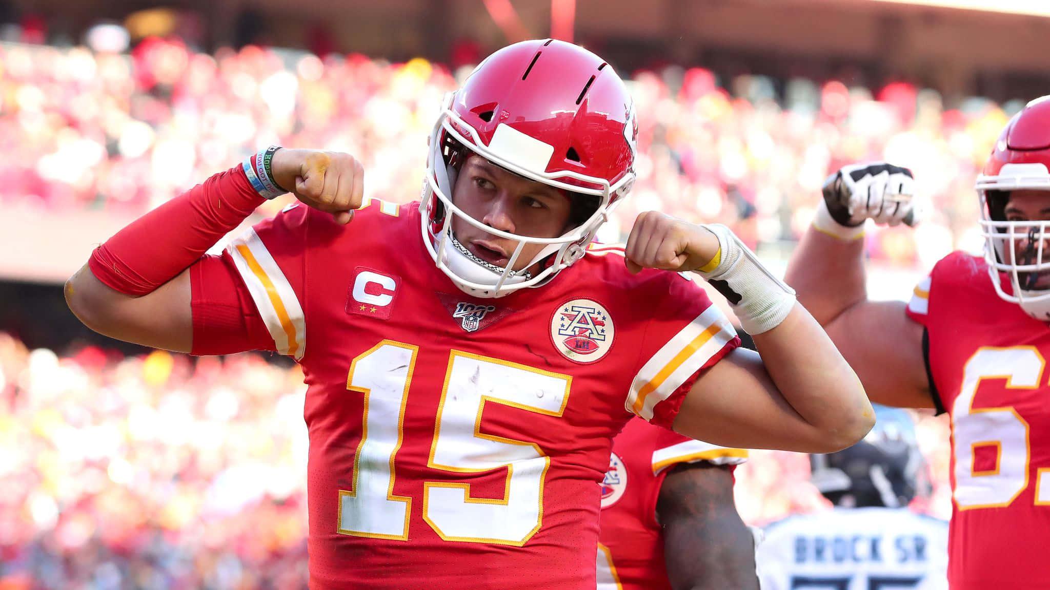 Quarterback Patrick Mahomes taking action during a football game — 2048x1152 wallpaper