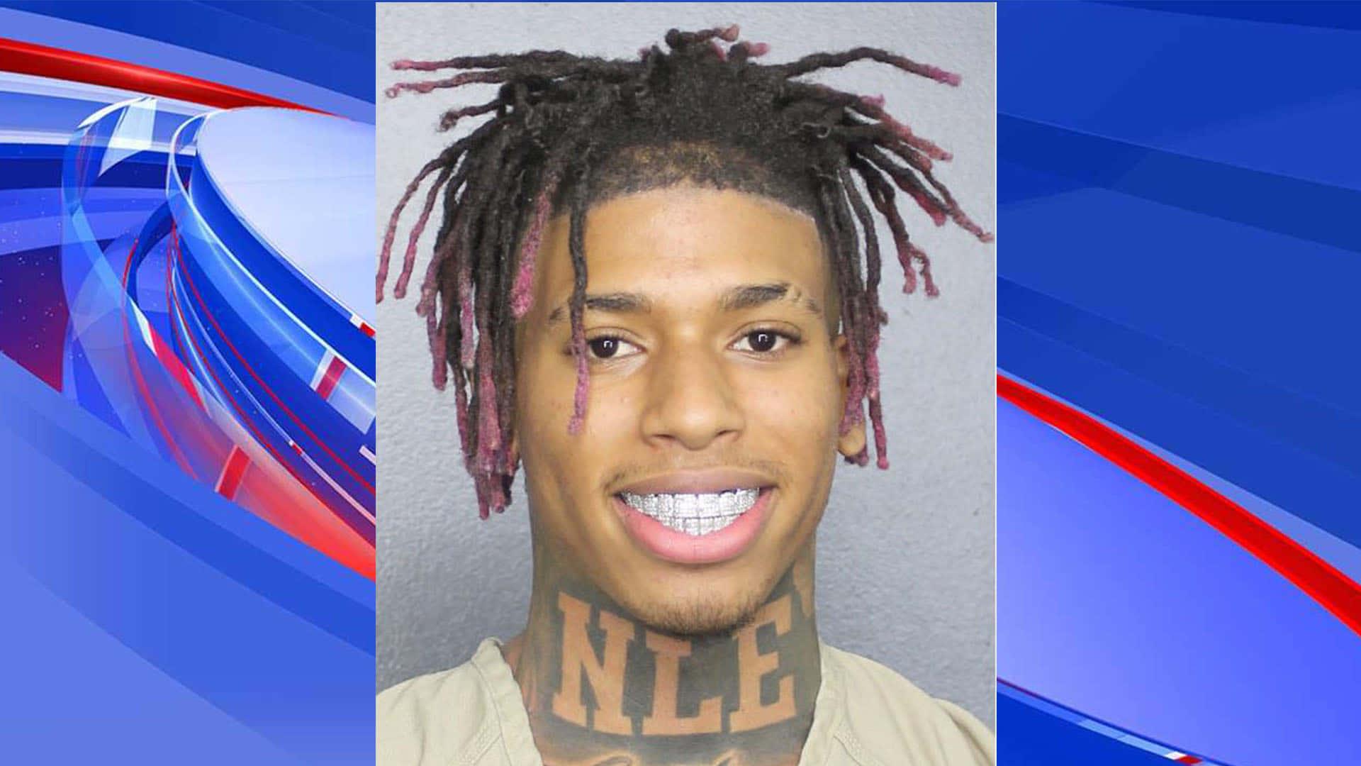 Rapper Nle Choppa striking a pose for the camera — 1920x1080 wallpaper
