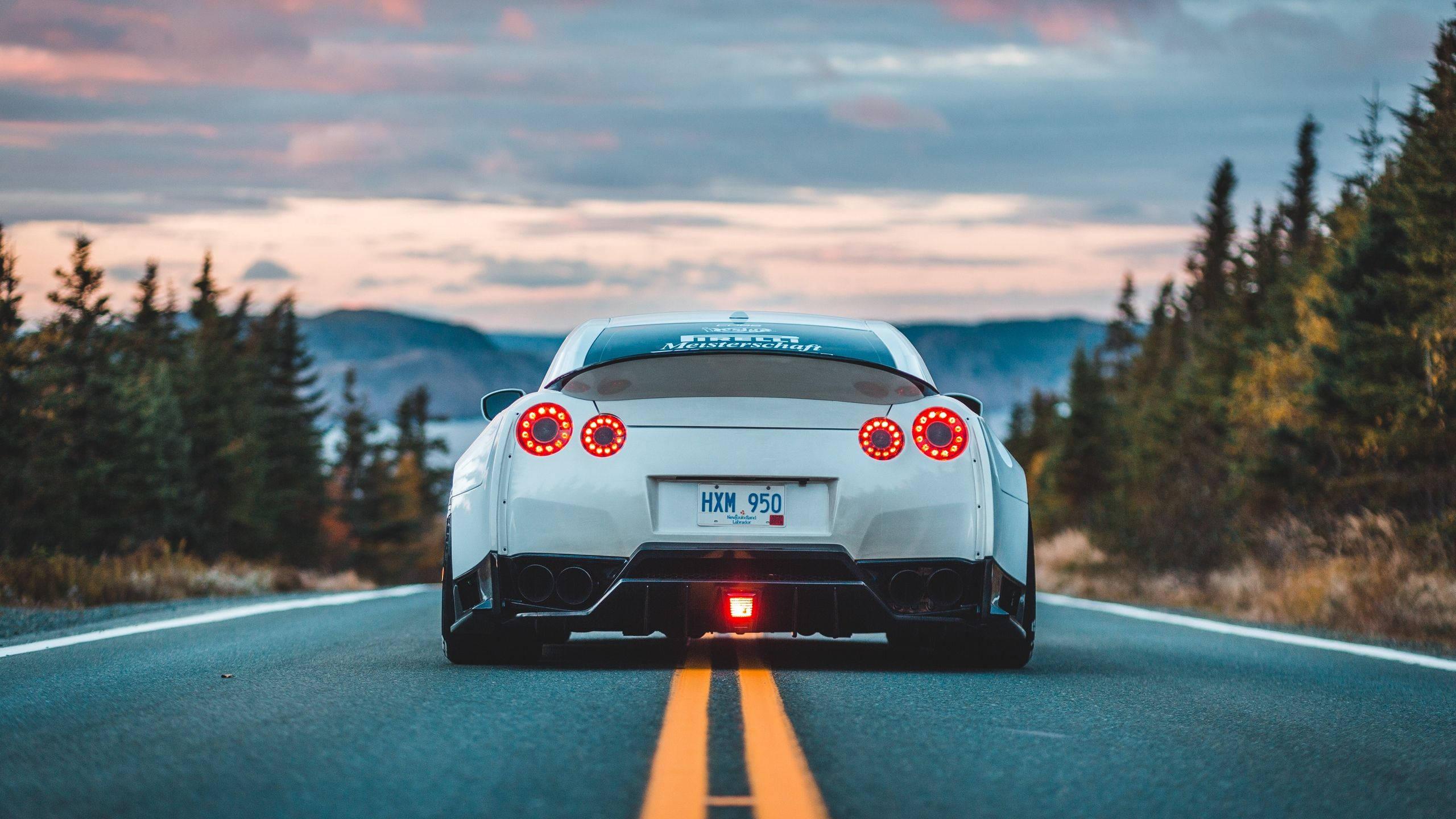 Rear Angle White Car — 2560x1440 wallpaper