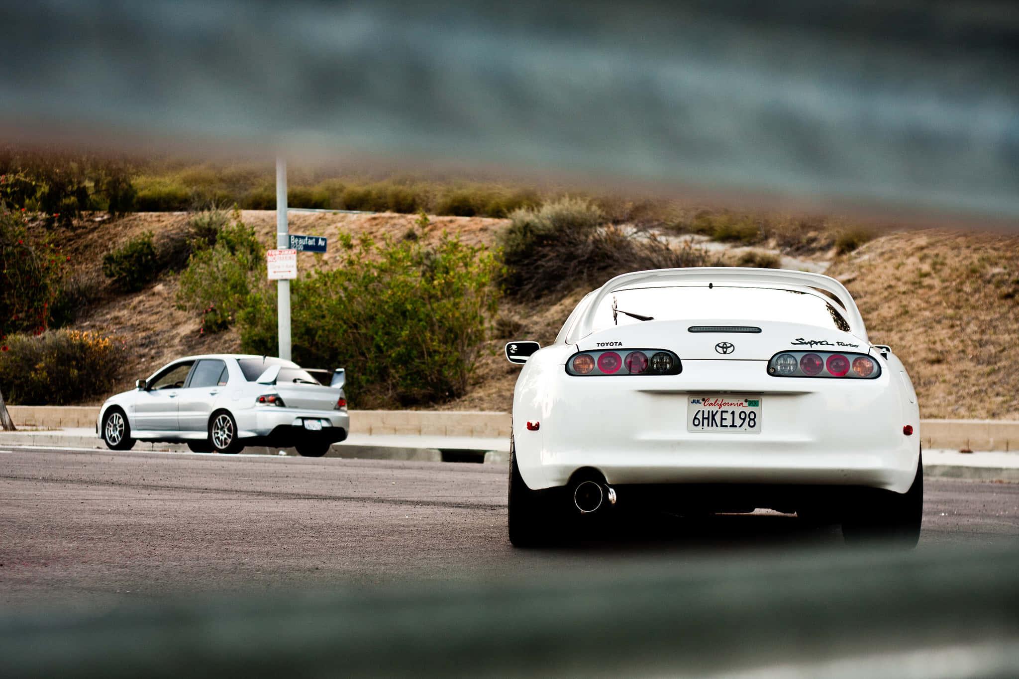 Red Toyota Supra on the Road — 2048x1365 wallpaper